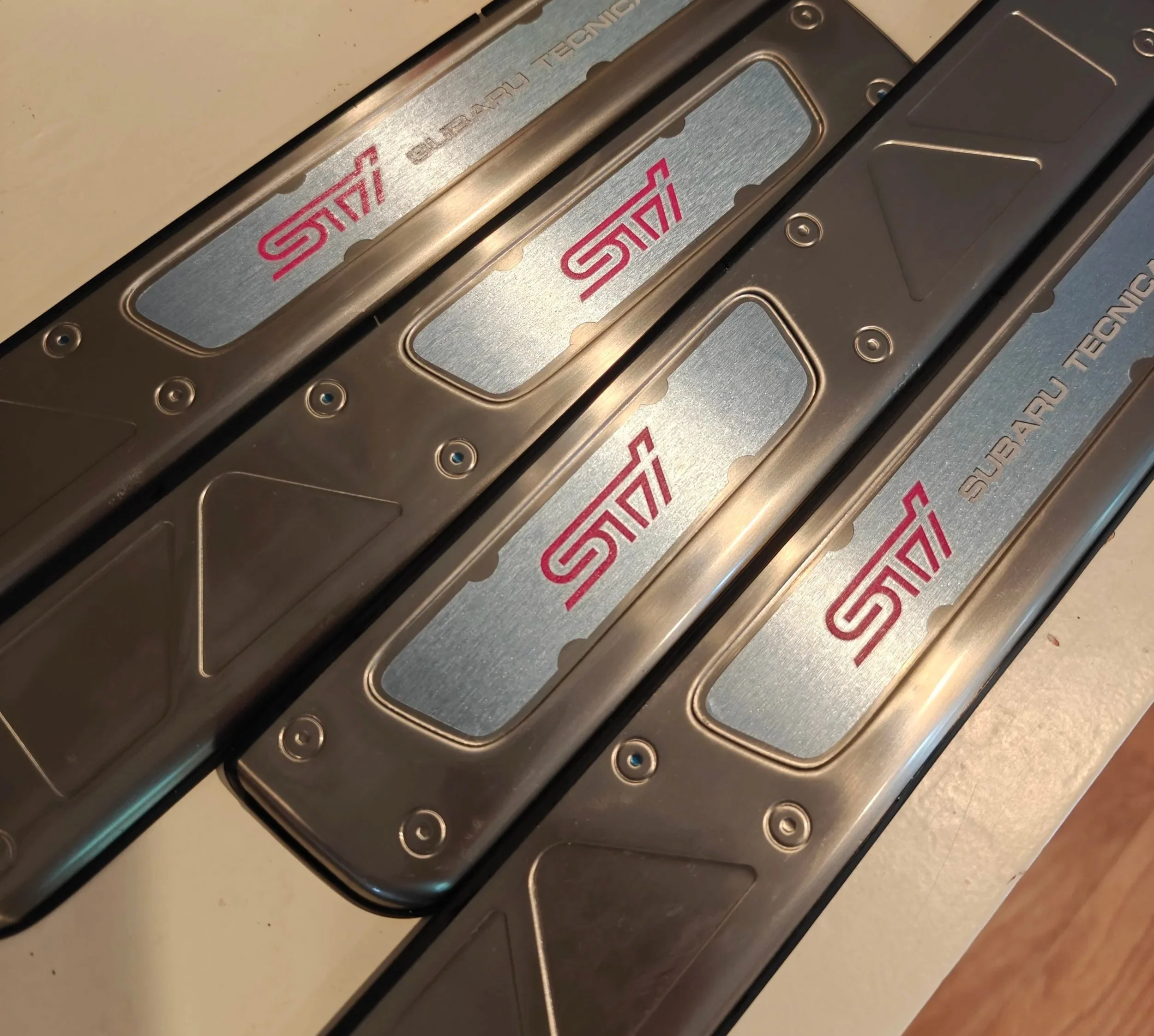 Make your own STi door sill plates or refresh a set. Hack the JDM parts market!