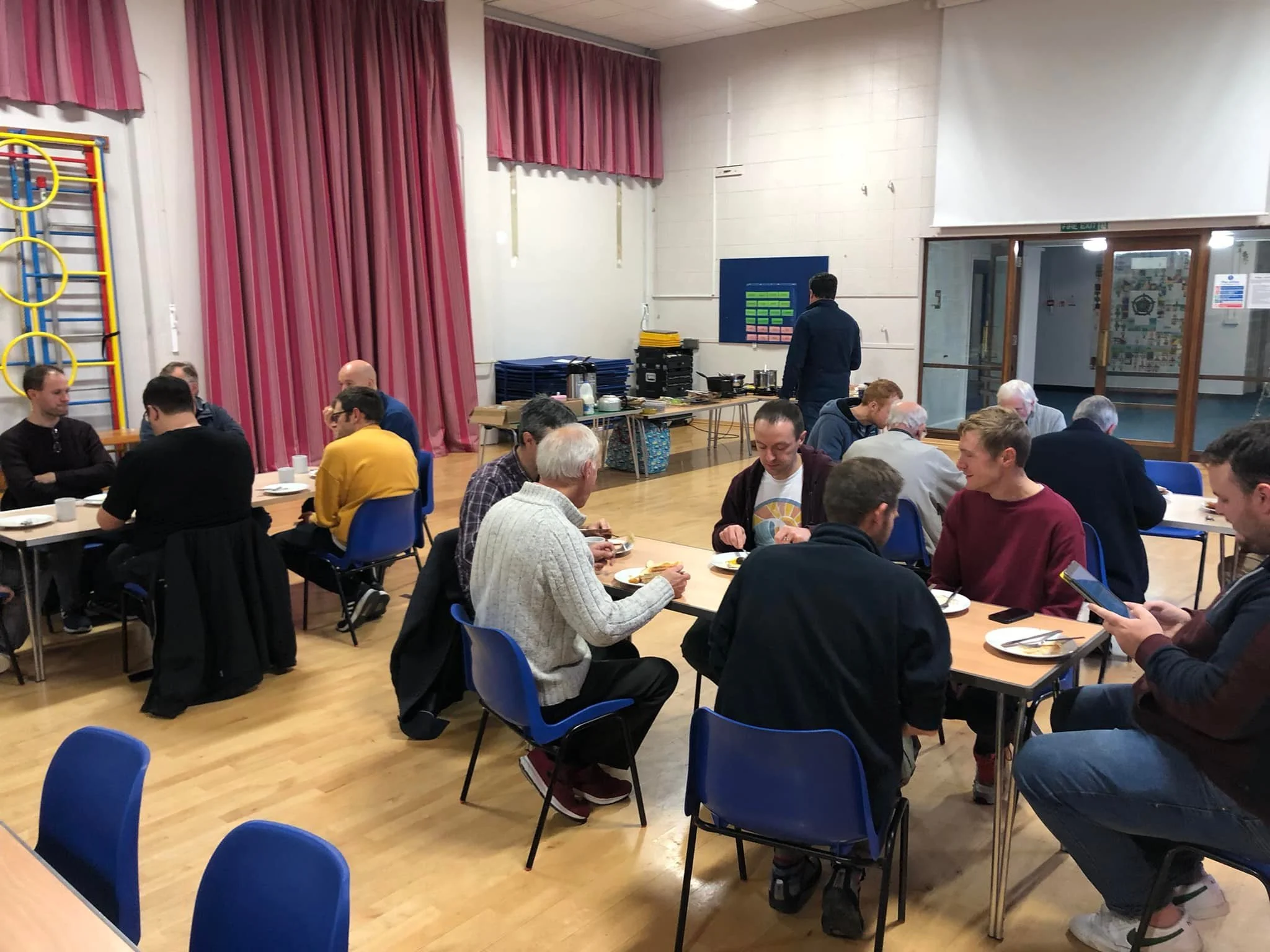 group-of-men-eating-at-a-table-in-school.jpg
