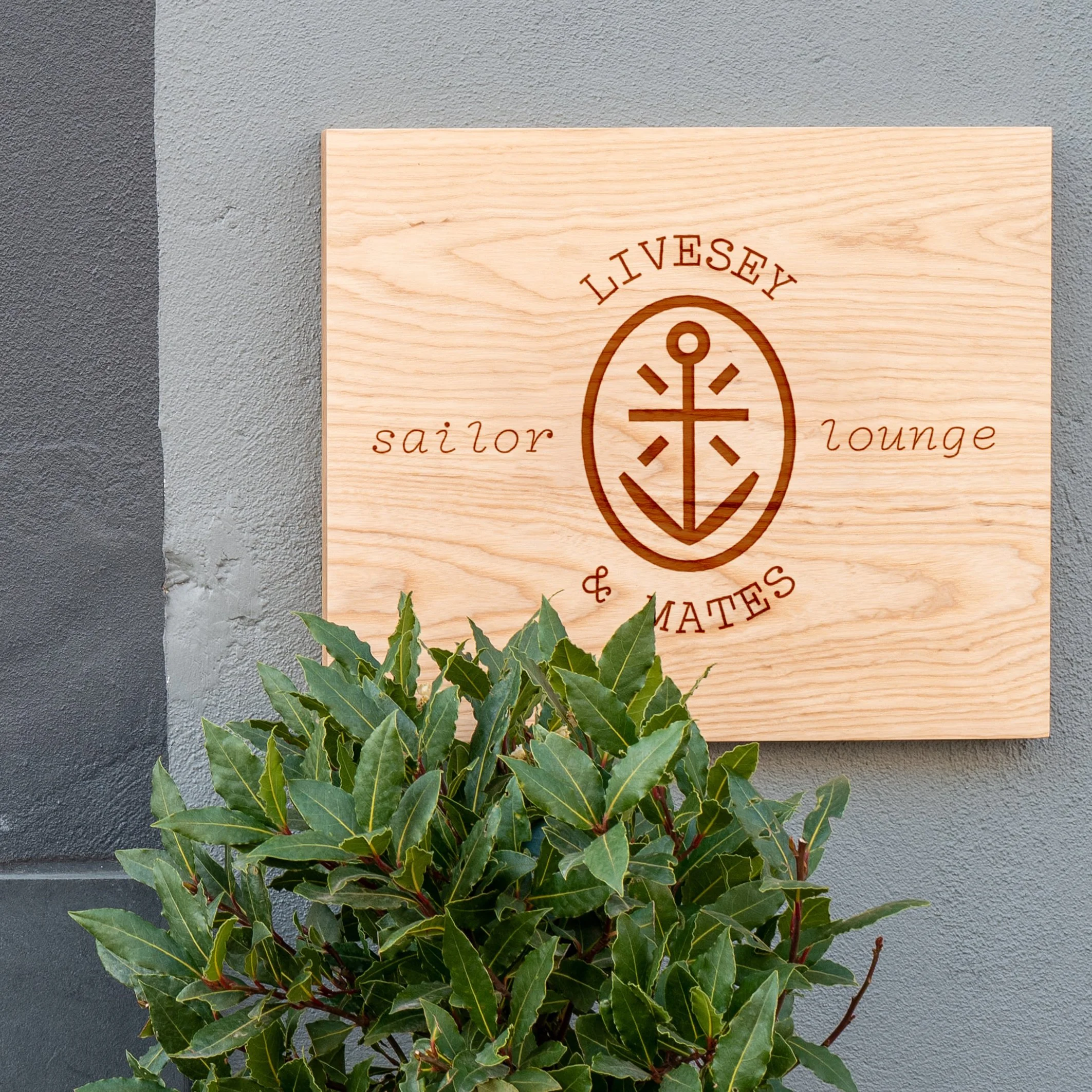 lc_logos_anchor-elipse_wood-sign.jpg