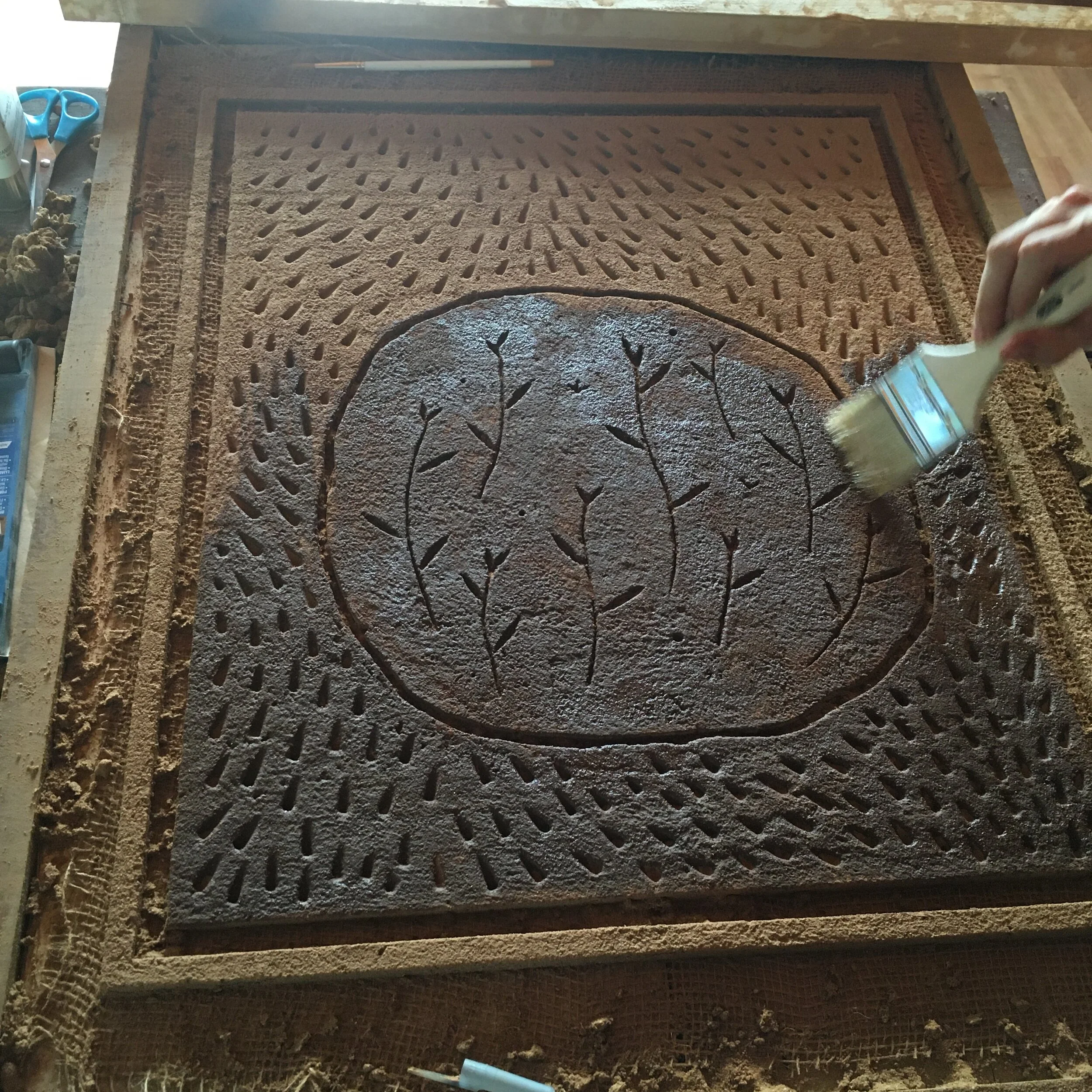  Oiling the surface with linseed oil and wax to create a more waterproof surface that ink can be applied too. 