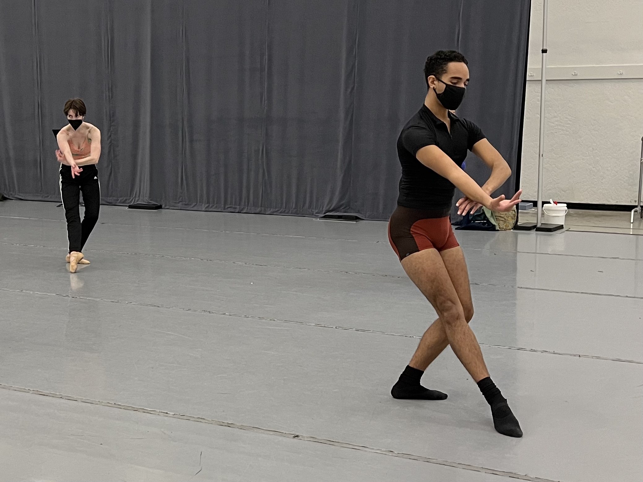 Dancers Thomas Baxter and Bryn Graham rehearsing New Ballet's Fast Forward program. Photo courtesy of New Ballet.
