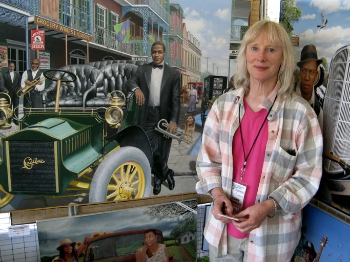 Chris Osborne with her painting of Buddy Bolden.