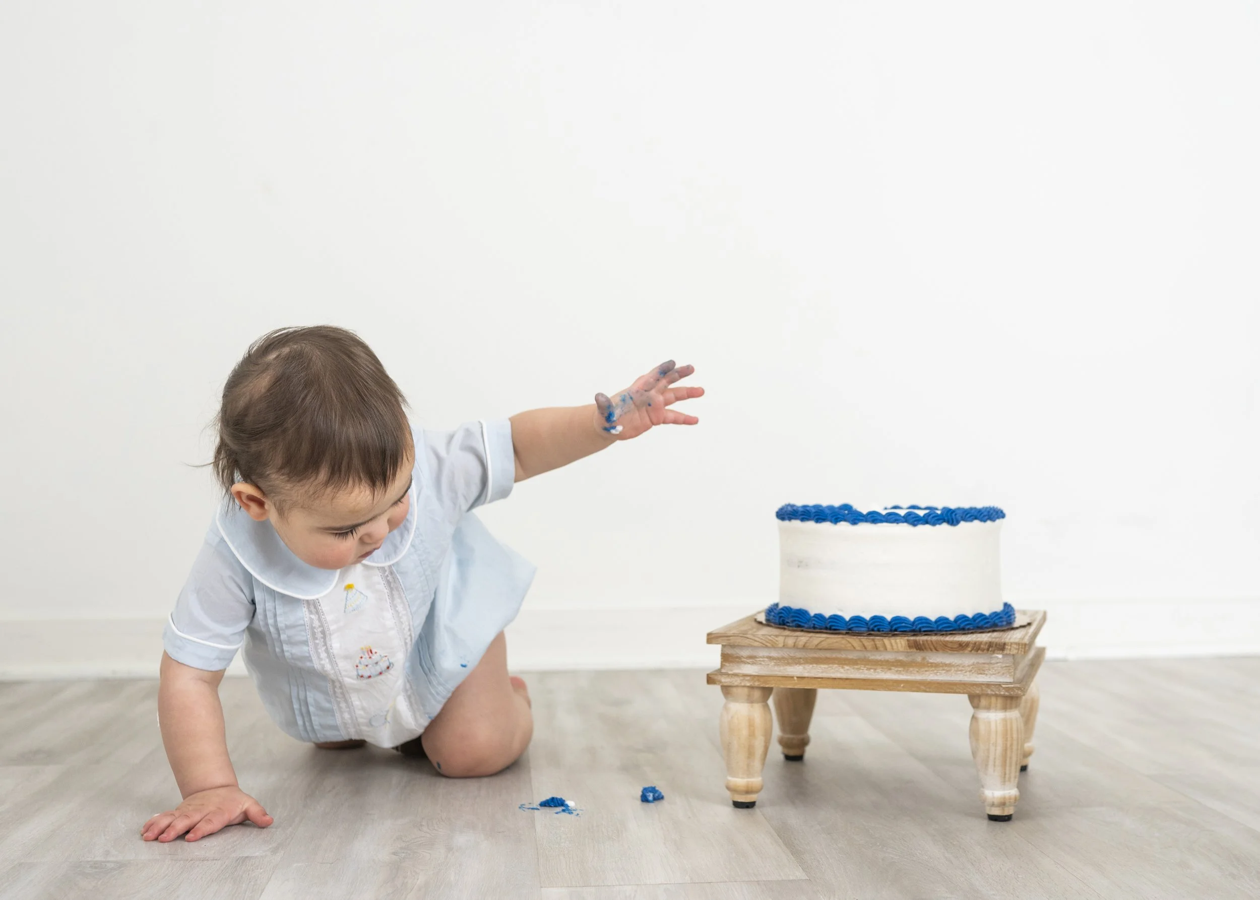 What if my child doesn’t like the cake during their cake smash photo session?