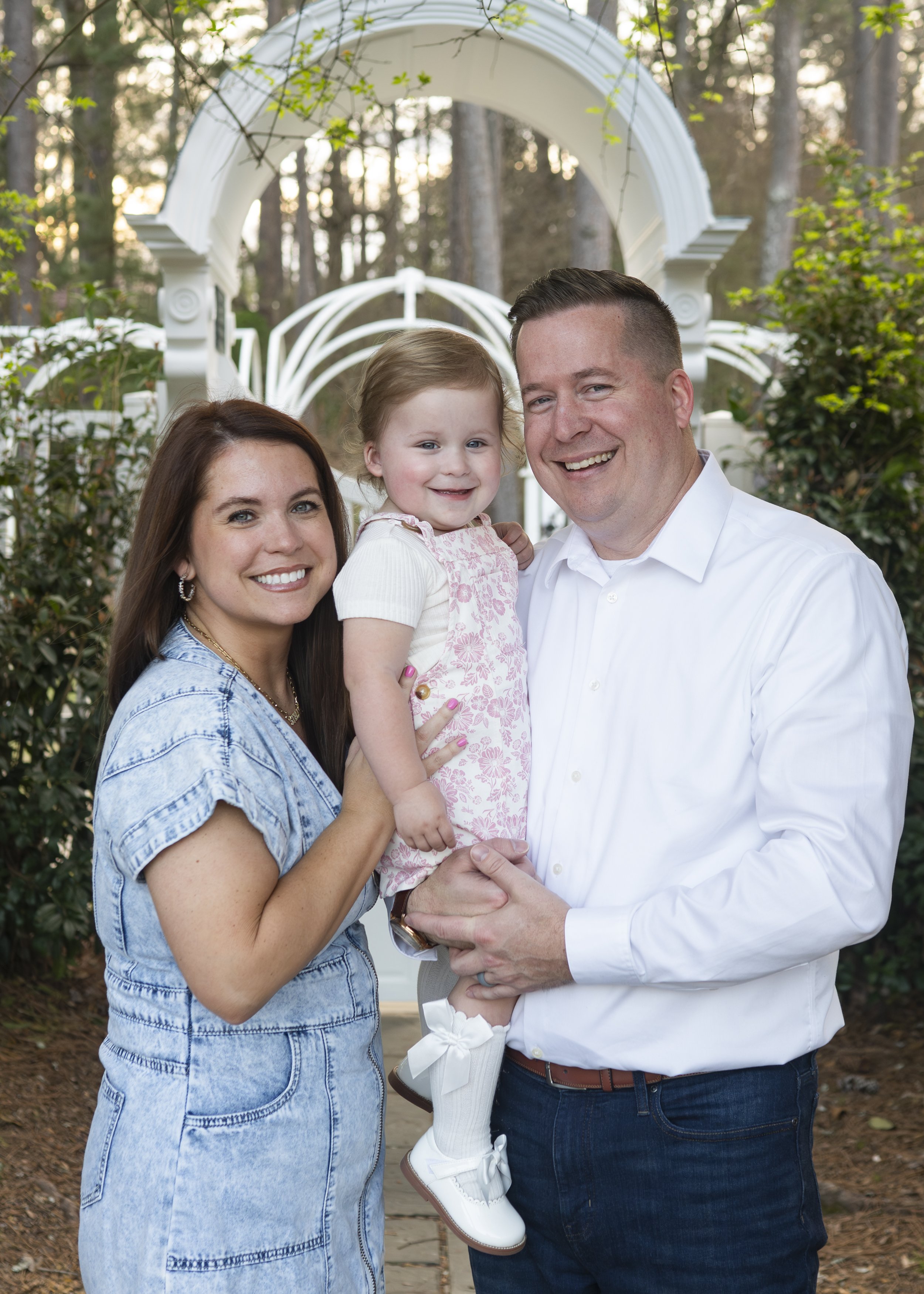 Family of 3 at the Birmingham Botanical Gardens . Family Photographer Birmingham AL