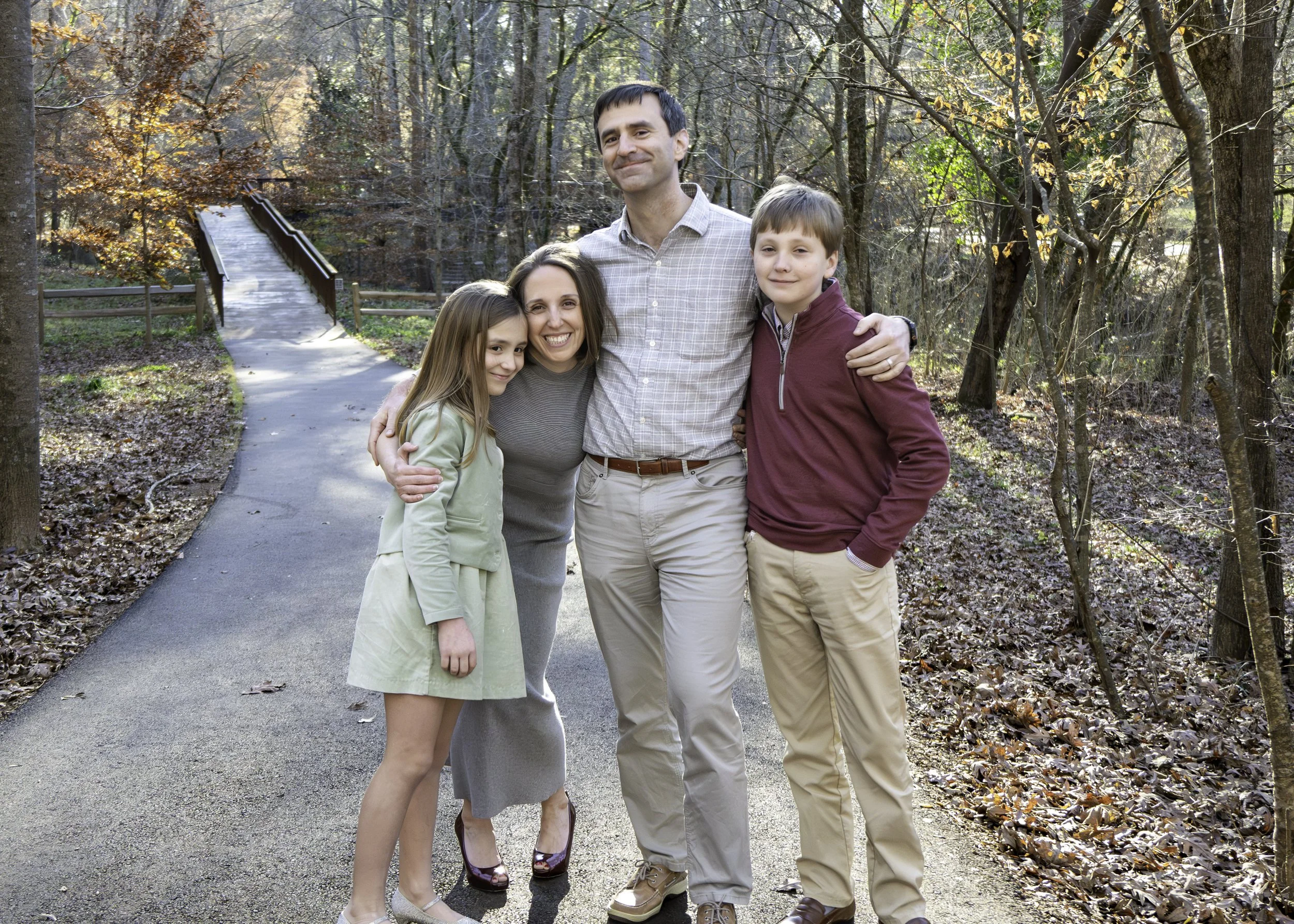 Relaxed family photography at Jemison Trail in Mountain Brook capturing genuine smiles and natural connection.