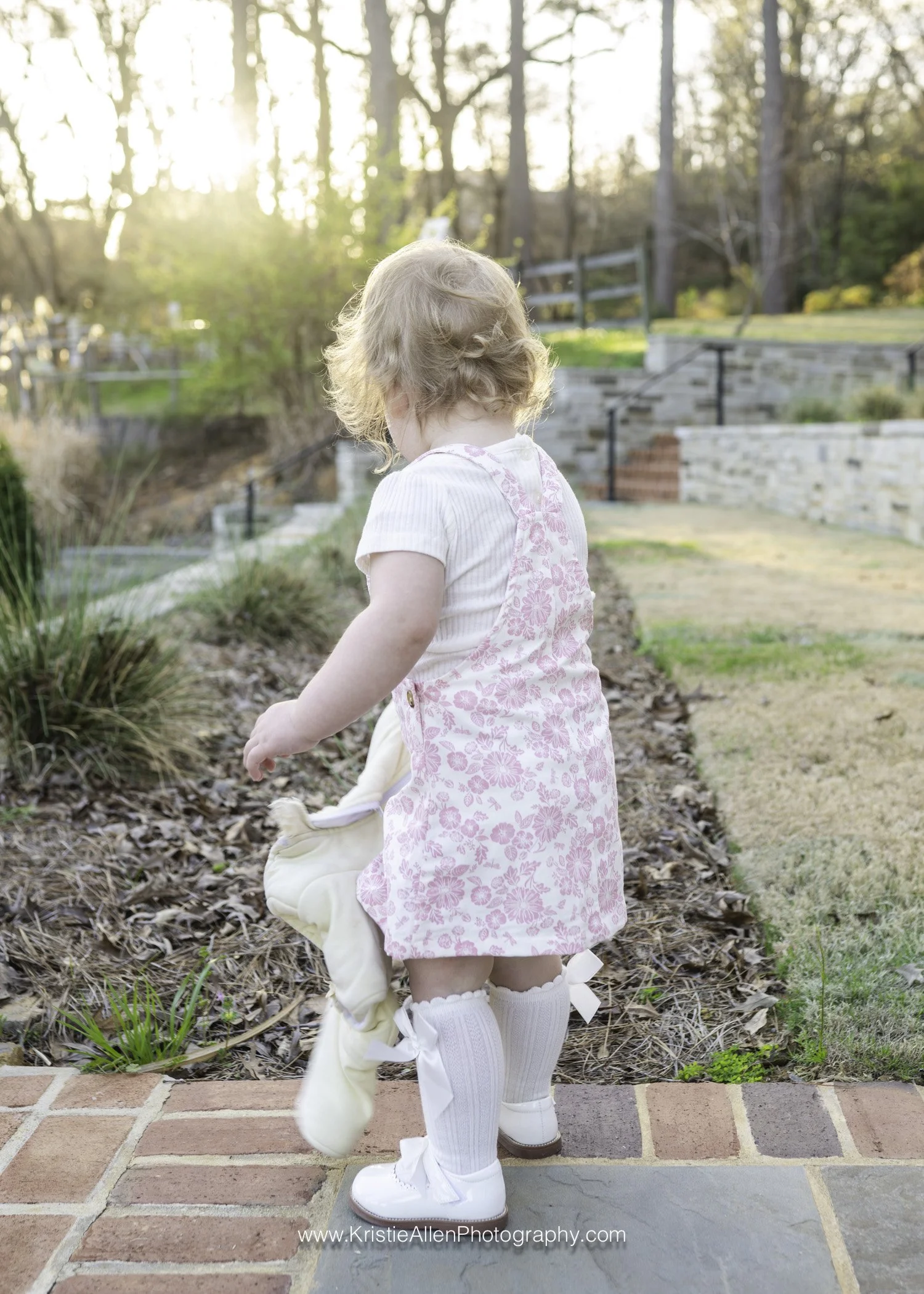  little girls standing at the gardens in birmingham  
