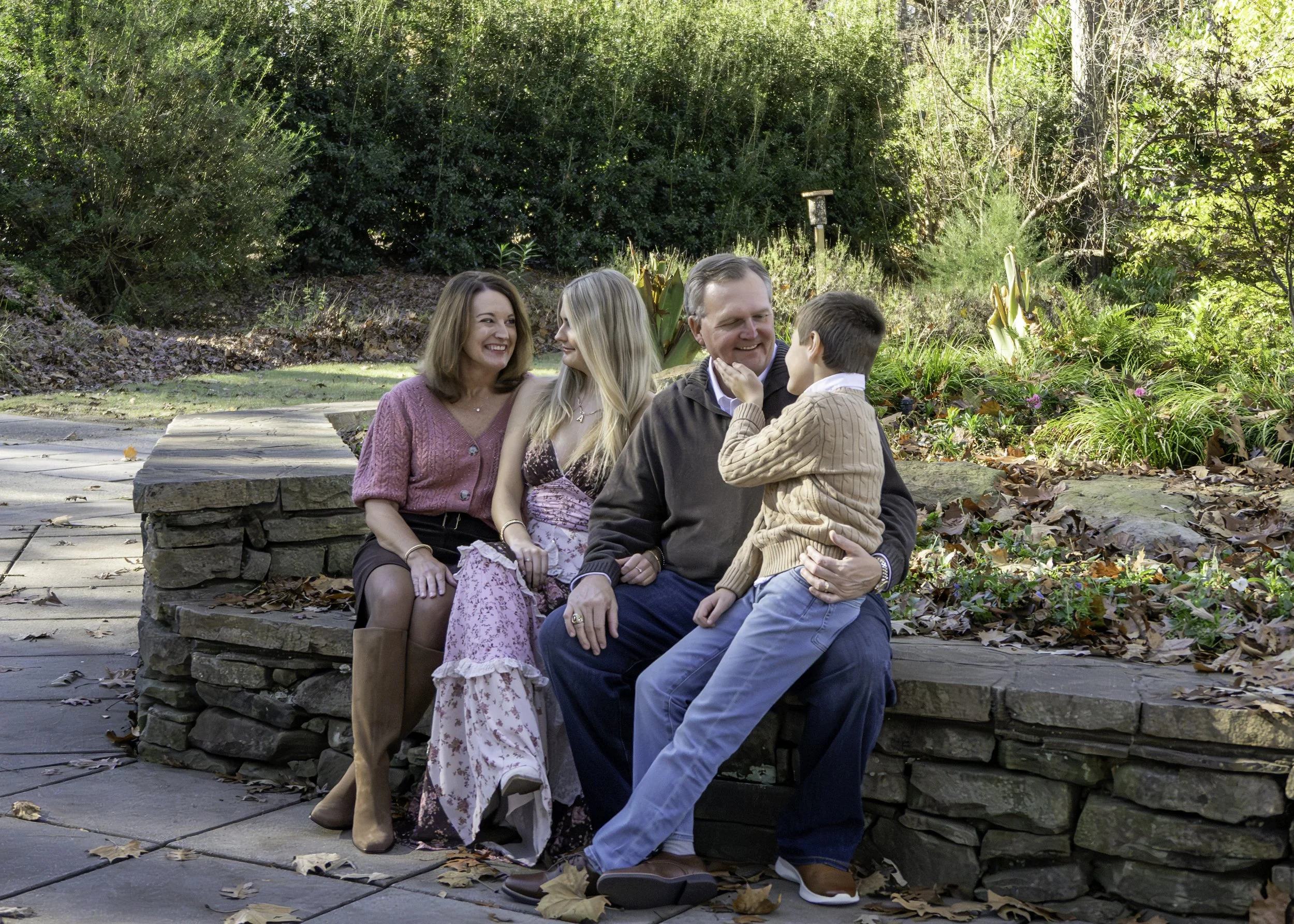 Outdoor family photo session in Birmingham, AL captured during the warm light of fall.