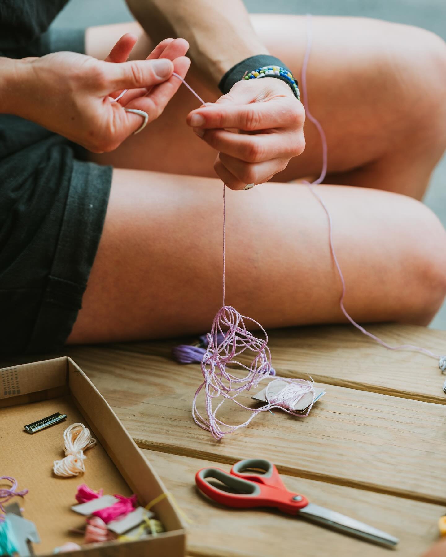 &ldquo;We spent many &ldquo;free time&rdquo; afternoons making friendship bracelets to wear and to gift to new and old friends. Sometimes counselors taught campers a new knot or pattern, but just as often campers became the teachers. We love those fl