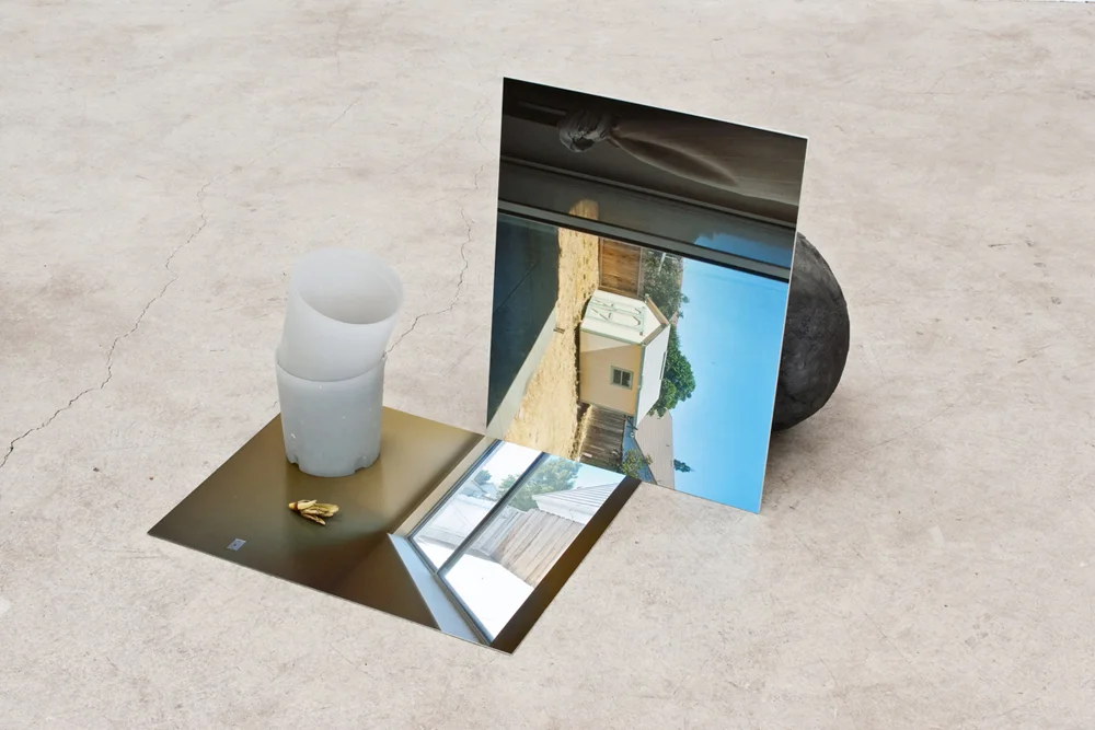 Recinere (Deadhead), 22” x 30” x 33”, pigment prints mounted on aluminum, cement, glass, paper, 2010