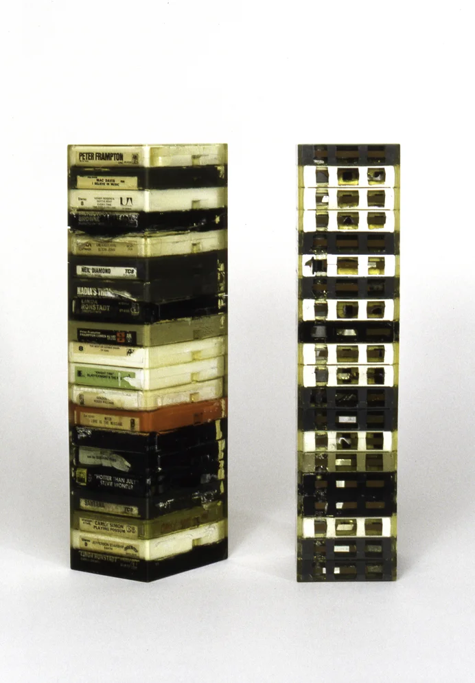 Orbita Octo (Peter), 17” x 4” x 5 1/2”, eight track tapes, resin, 1999 andOrbita Octo (Barry), 17” x 4” x 5 1/2”, eight track tapes, resin, 1999