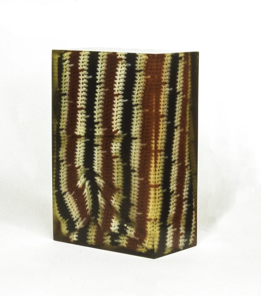 Lodix (Green, Red, and White), 14 1/4” x 9 1/2” x 5 1/4”, blanket, resin, 1999