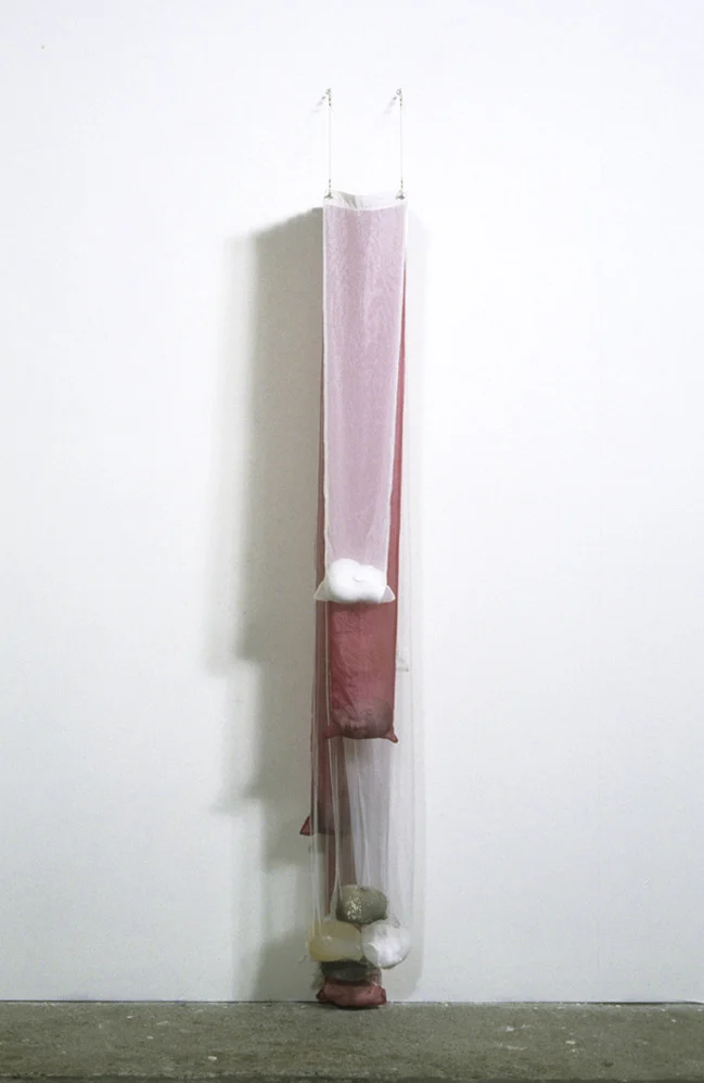 Untitled (Dream), 85” x 12” x 14”, plaster, cement, silicon, fabric, steel, 1997