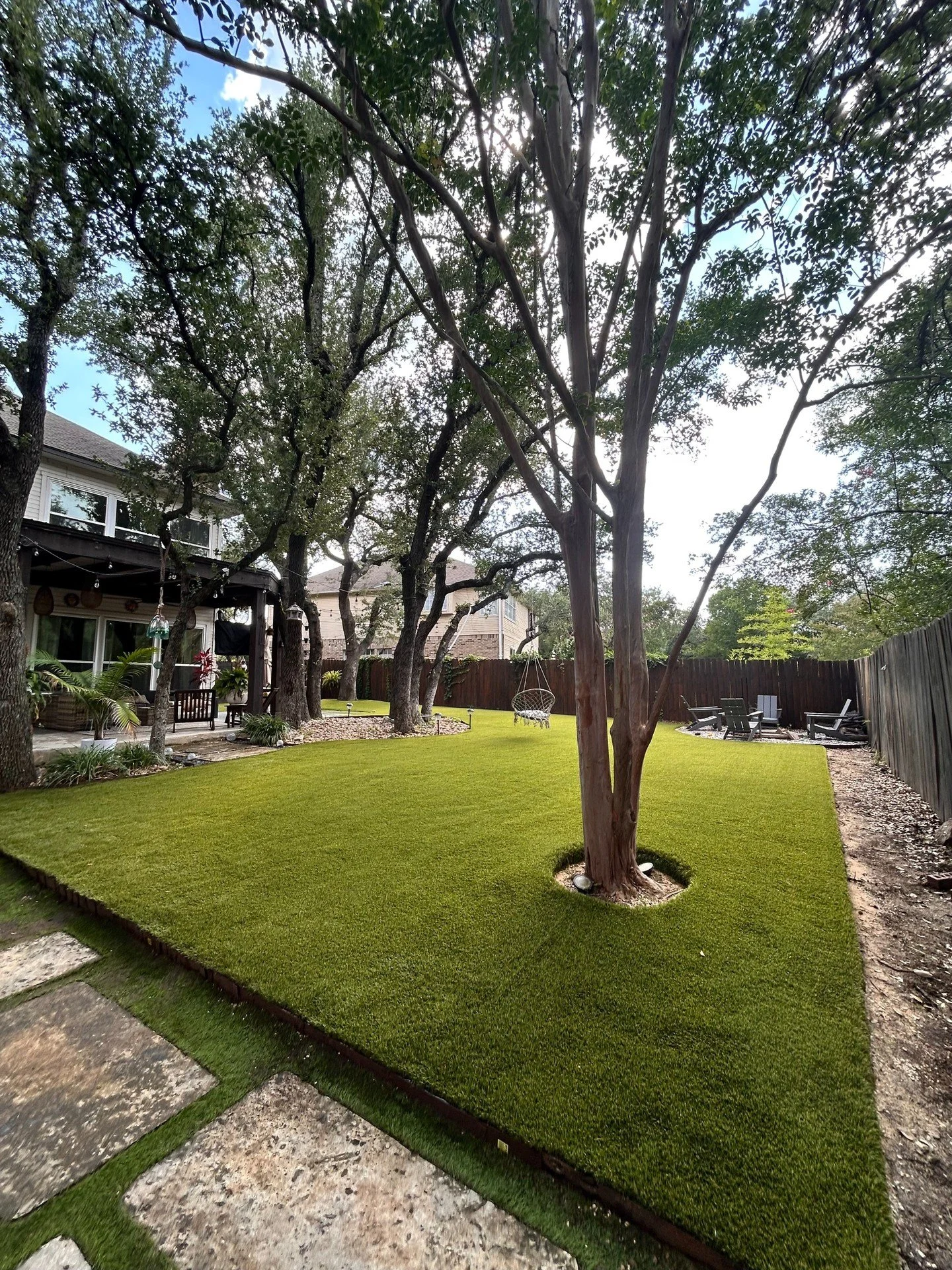 The install is complete&mdash;and the results speak for themselves. 💚🏡

This ForeverLawn Landscape Grass transformation turned a worn-out yard into a lush, low-maintenance dream. And those tree wells? 👌 Custom-cut with care to protect the trees an