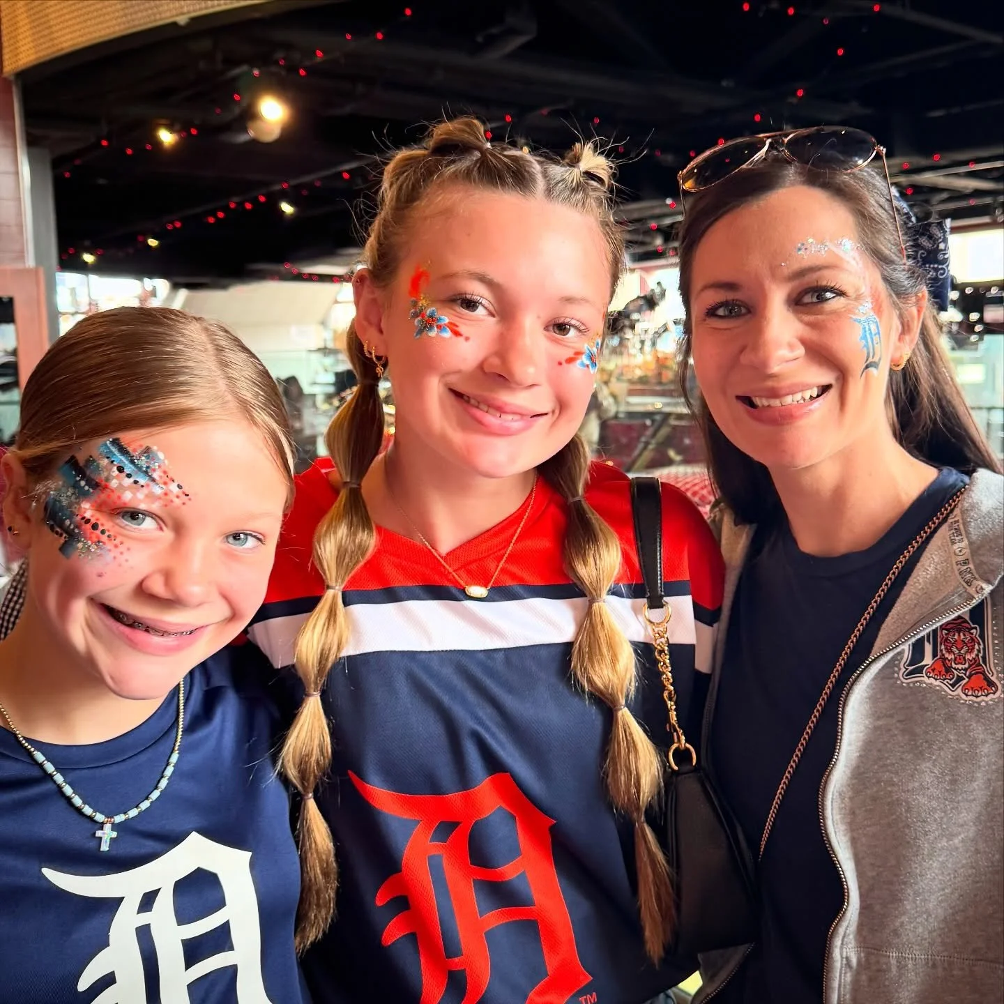 Beautiful babes with Tigers face paint! 🐯