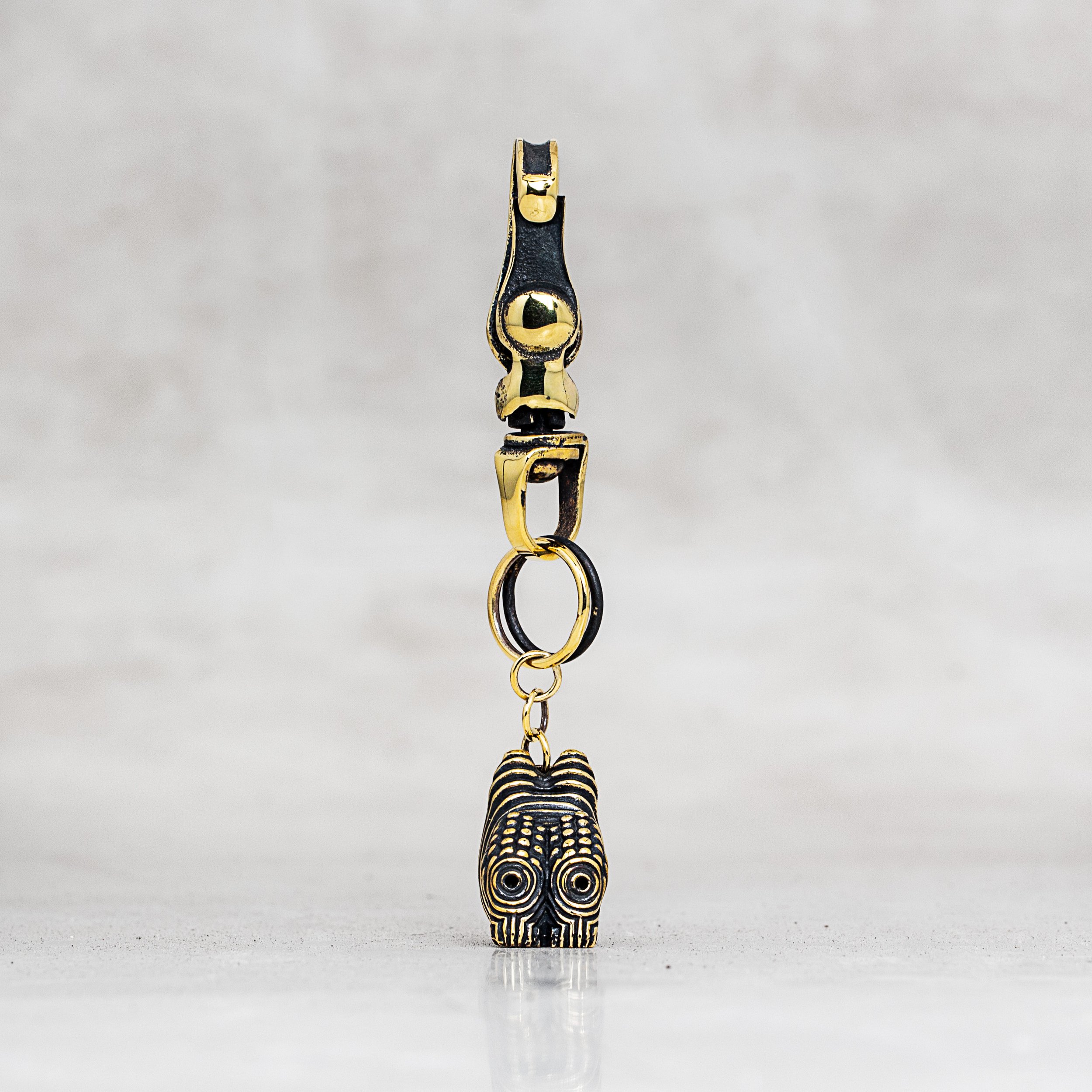 BCEHeadKeychainBrassFront.jpg