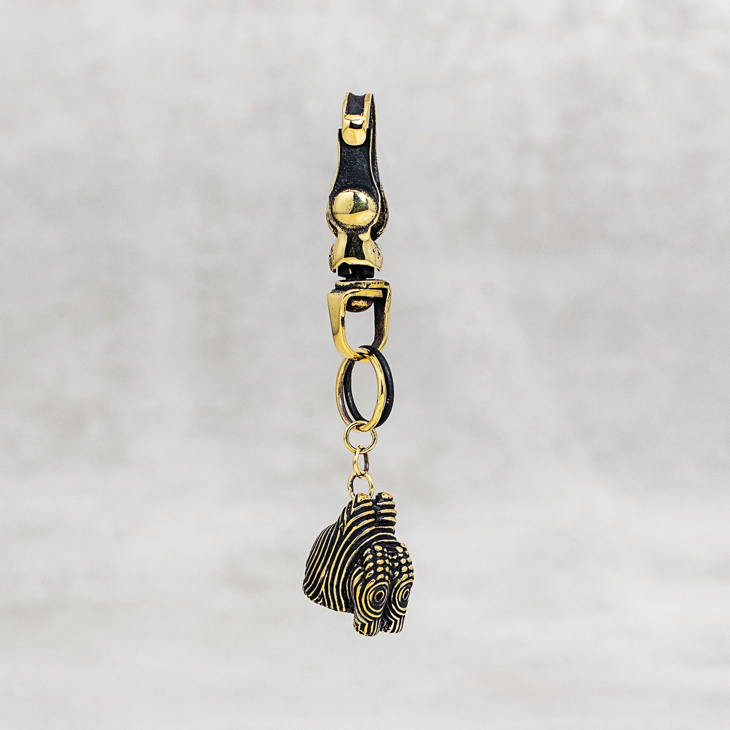 BCEHeadKeychainBrassQtr.jpg