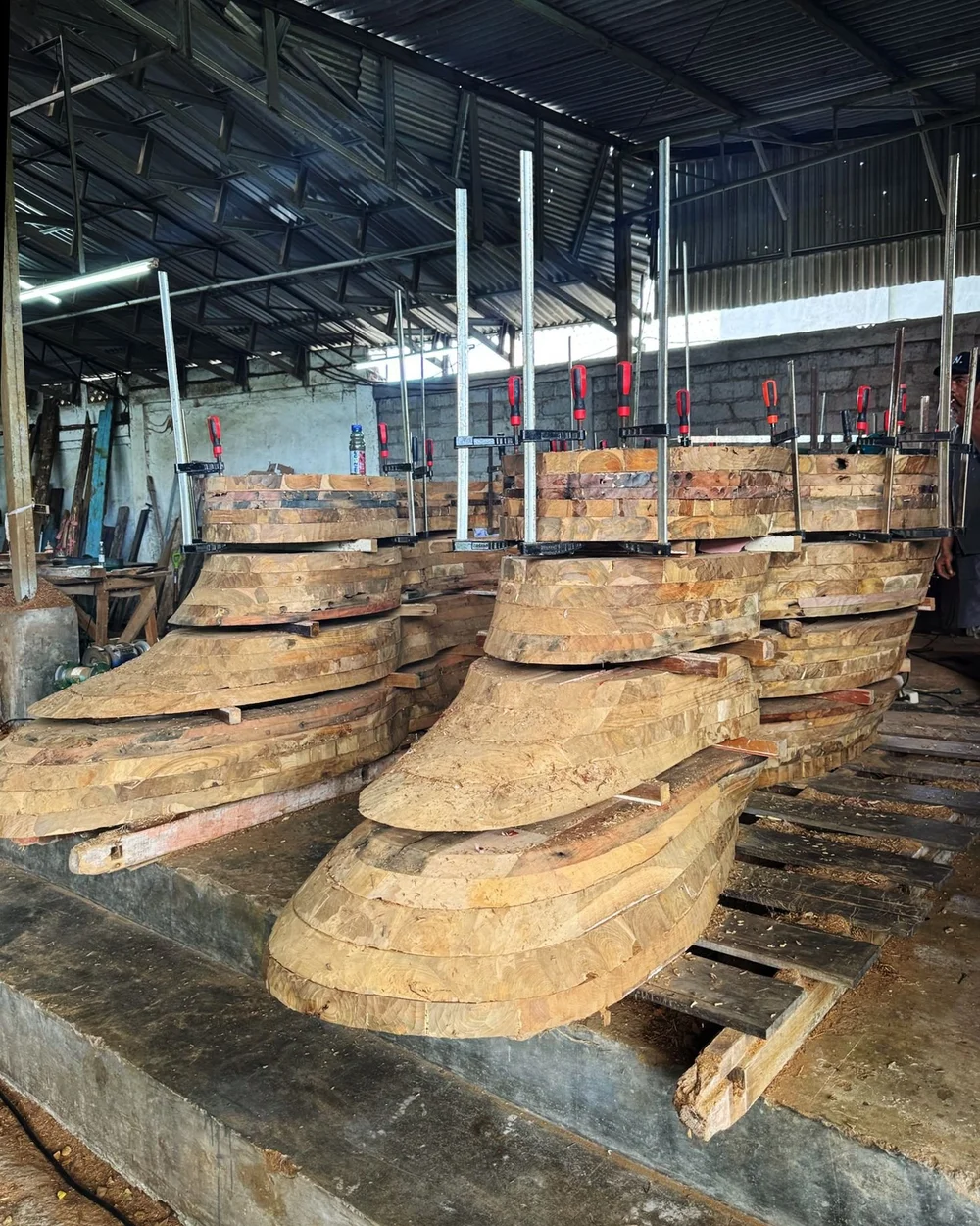 Laminated reclaimed wood sections during fabrication