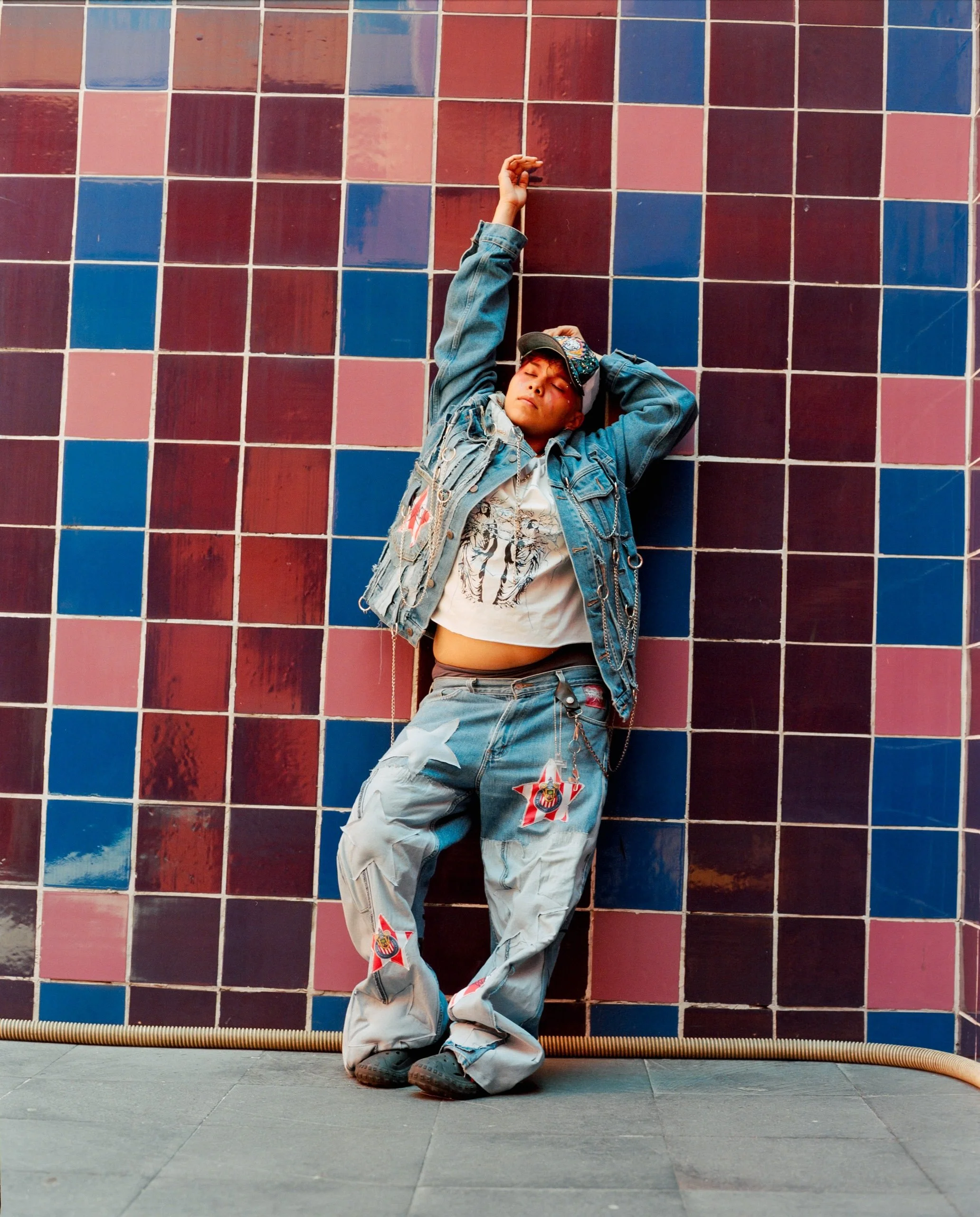a-caged-dog-barks-the-fiercest-mexico-city-2024-denim-portrait-tiled-wall-ryan-otoole-collett.jpeg