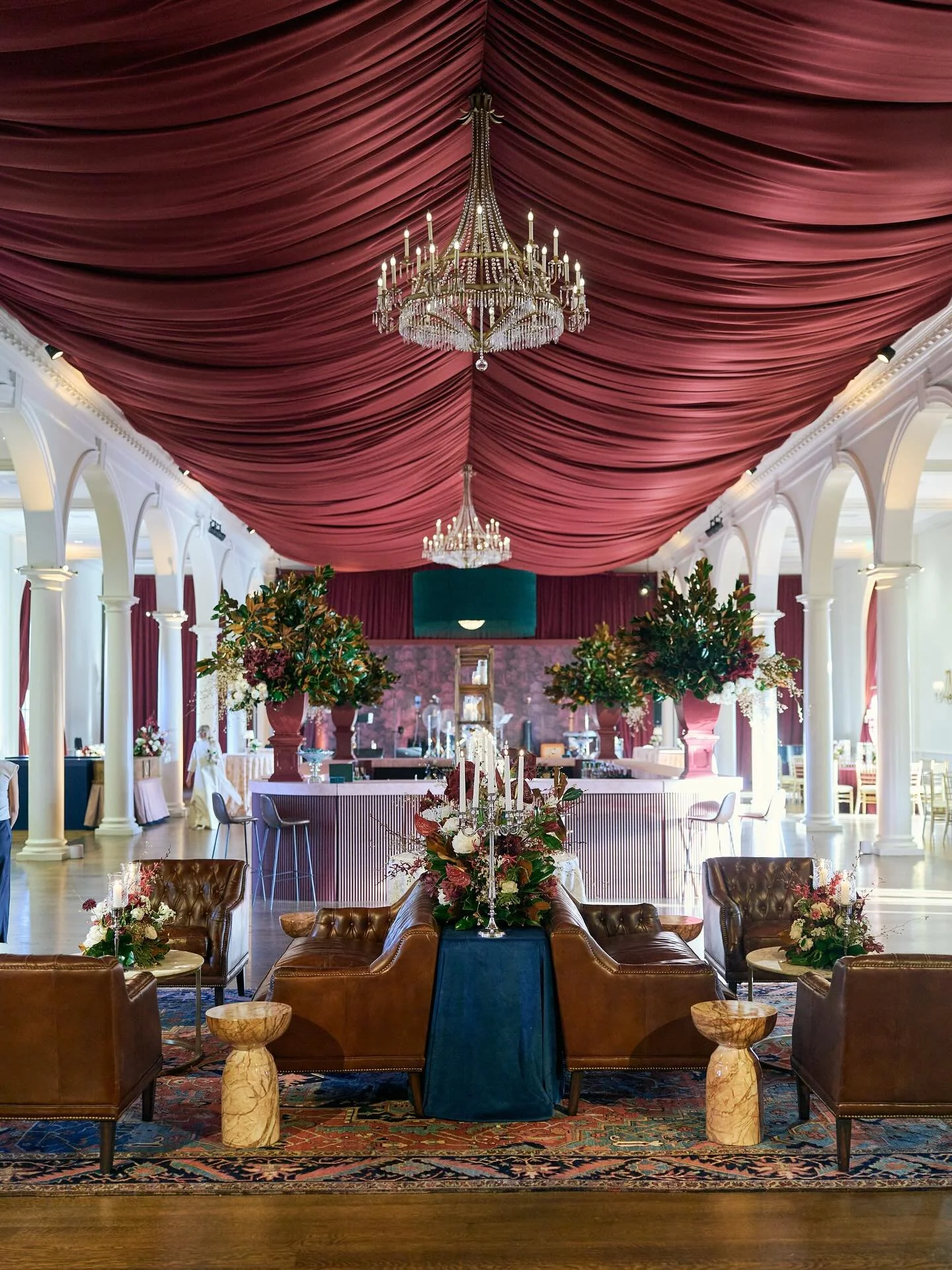 Recreating a beloved D.C. bar inside a Birmingham ballroom was no small task. The bride, Alice, shared a few photos, a love for leather, and a palette of deep rich tones. From there, she trusted us to figure out the rest.

It took time to get the bal