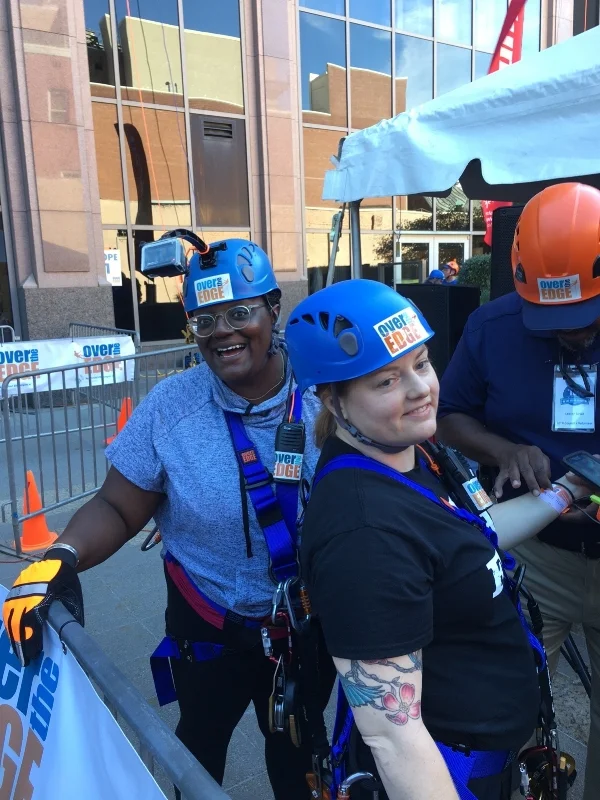 Erica Porter (left) and Rachel Thomas (right) participating in Over the Edge.