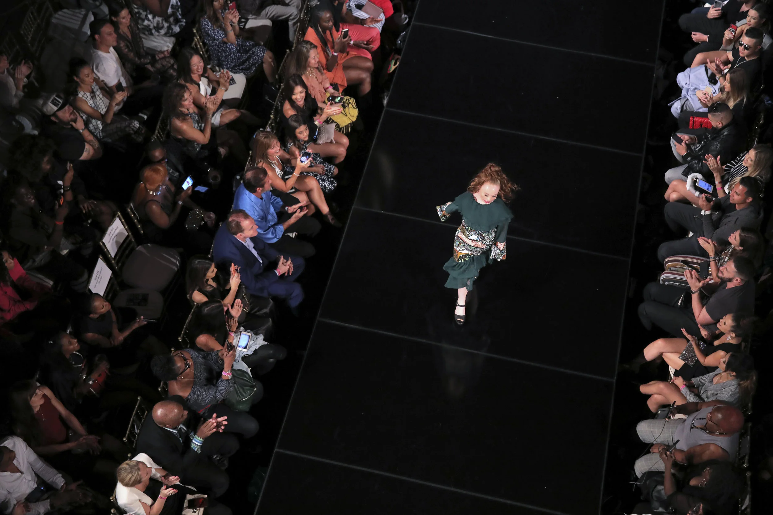  Madeline walks the runway in the House of Byfield presentation. Madeline is in constant demand, often walking in three shows a day.  