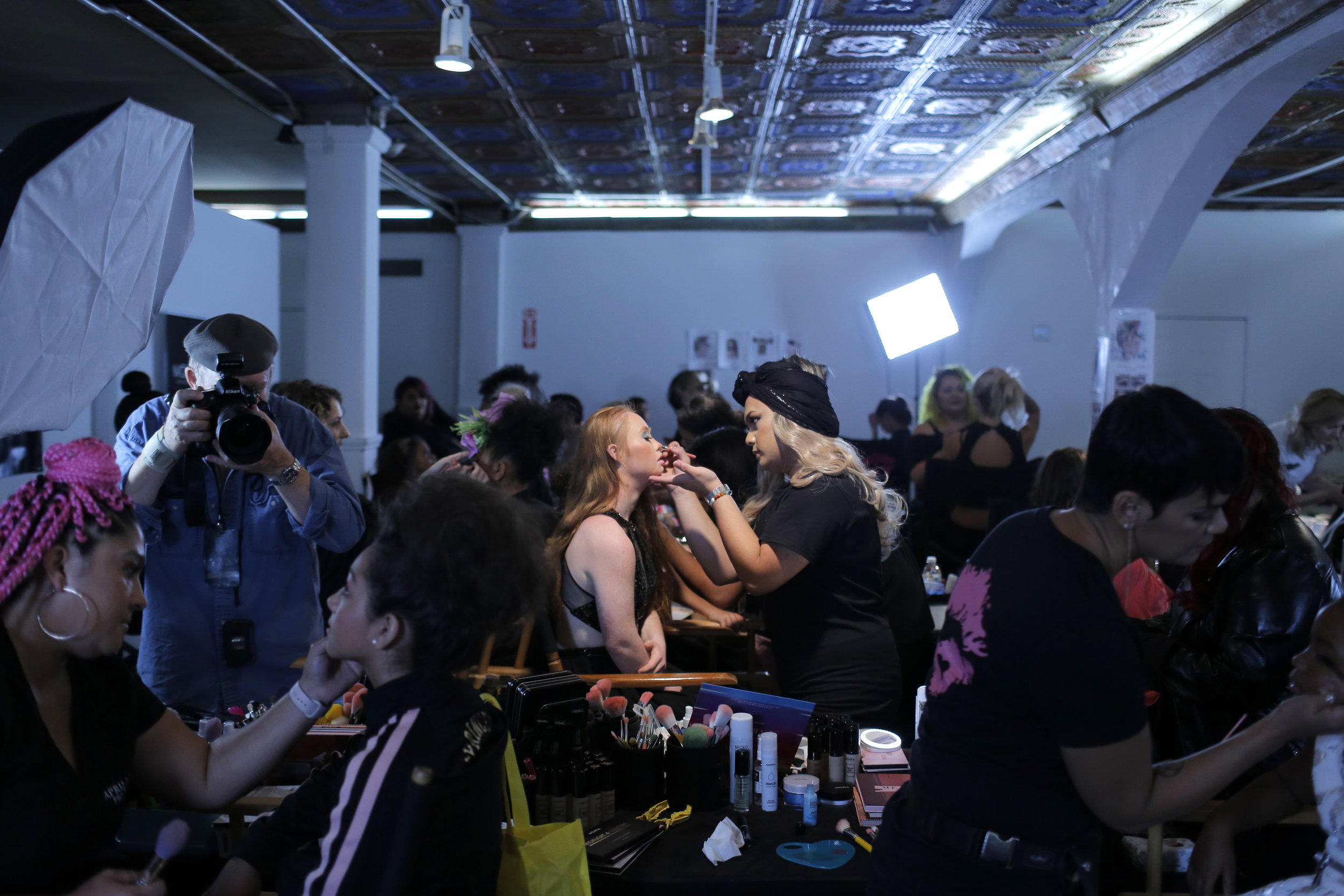  Madeline is prepared backstage before walking in the Lulu Et Gigi&nbsp;runway show.  