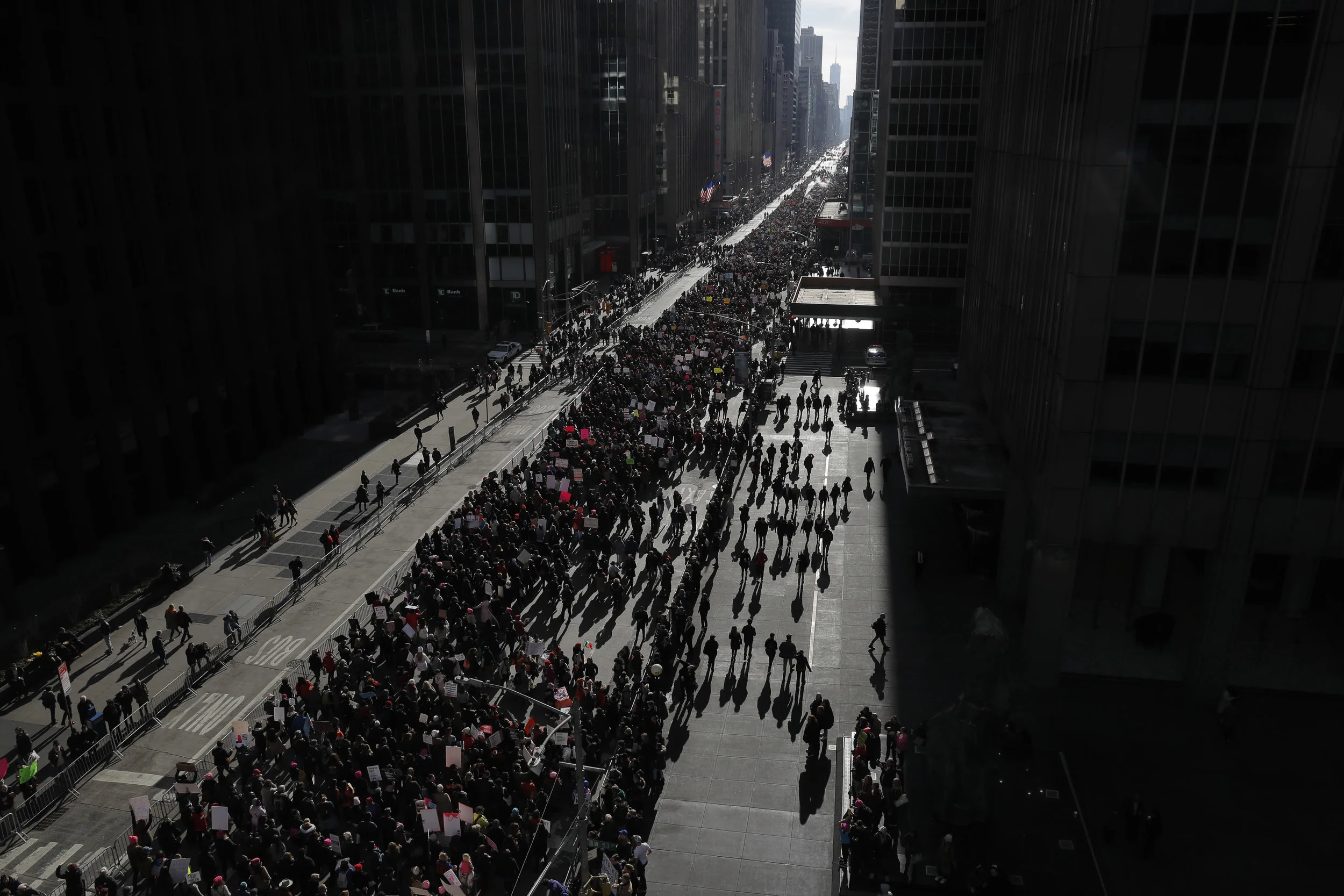 People walk down Sixth Avenue as they participate in the Women's March in Manhattan, New York City, New York. 2018.