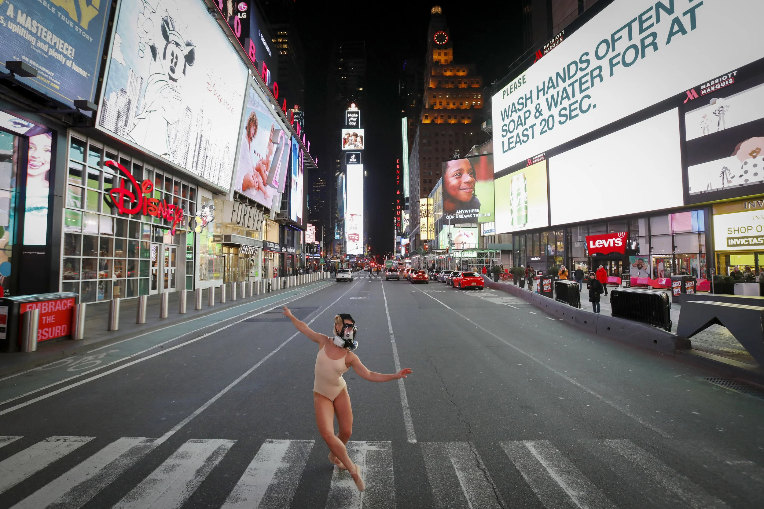  Ballet dancer and performer Ashlee Montague of New York wears a gas mask while she dances in Times Square. Ms Montague and others took advantage of the largely vacated New York City landmarks to capture once in a lifetime imagery.  