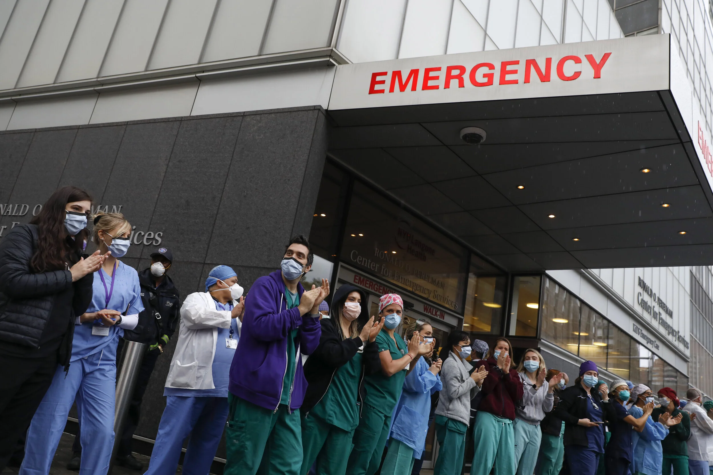  Healthcare workers at NYU Langone Health hospital in Manhattan stand and clap at 7:00pm, part of a daily ritual the celebrate frontline workers in the fight against coronavirus disease.  