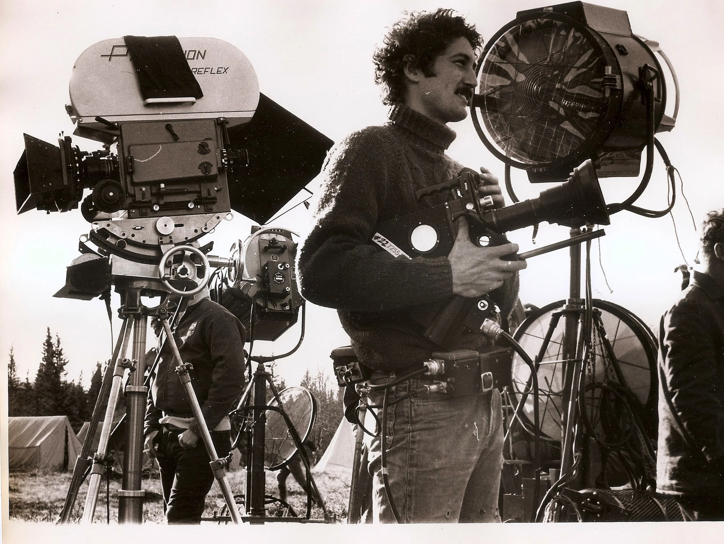 On the set of BIG MAN while filming doc THEMES AND VARIANTS. Although we were just a little 16mm doc film our technology was more advanced than theirs. We had radio mikes, an electric slate, hand held camera, and fast film.