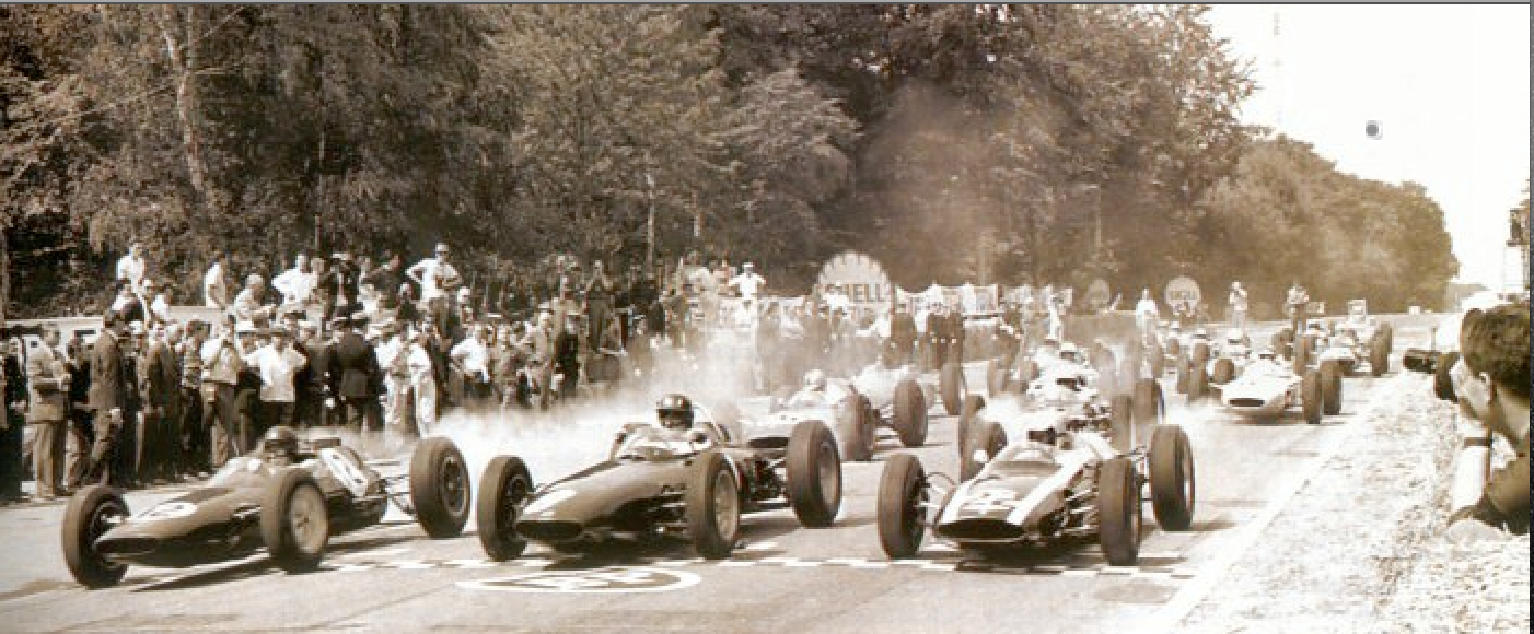 The start of the French Grand Prix at Rouen in 1962 and also the start of my career as a cameraman. I am one of the guys standing behind the grid with a camera (a 16mm Kodak K100 with a wind up motor). I had stumbled into the job during my 11th grade summer vacation in Europe. My instructions for this shot was to walk out among the last cars on the grid, turn the camera on when they raised the flag, and film until the motor ran down.