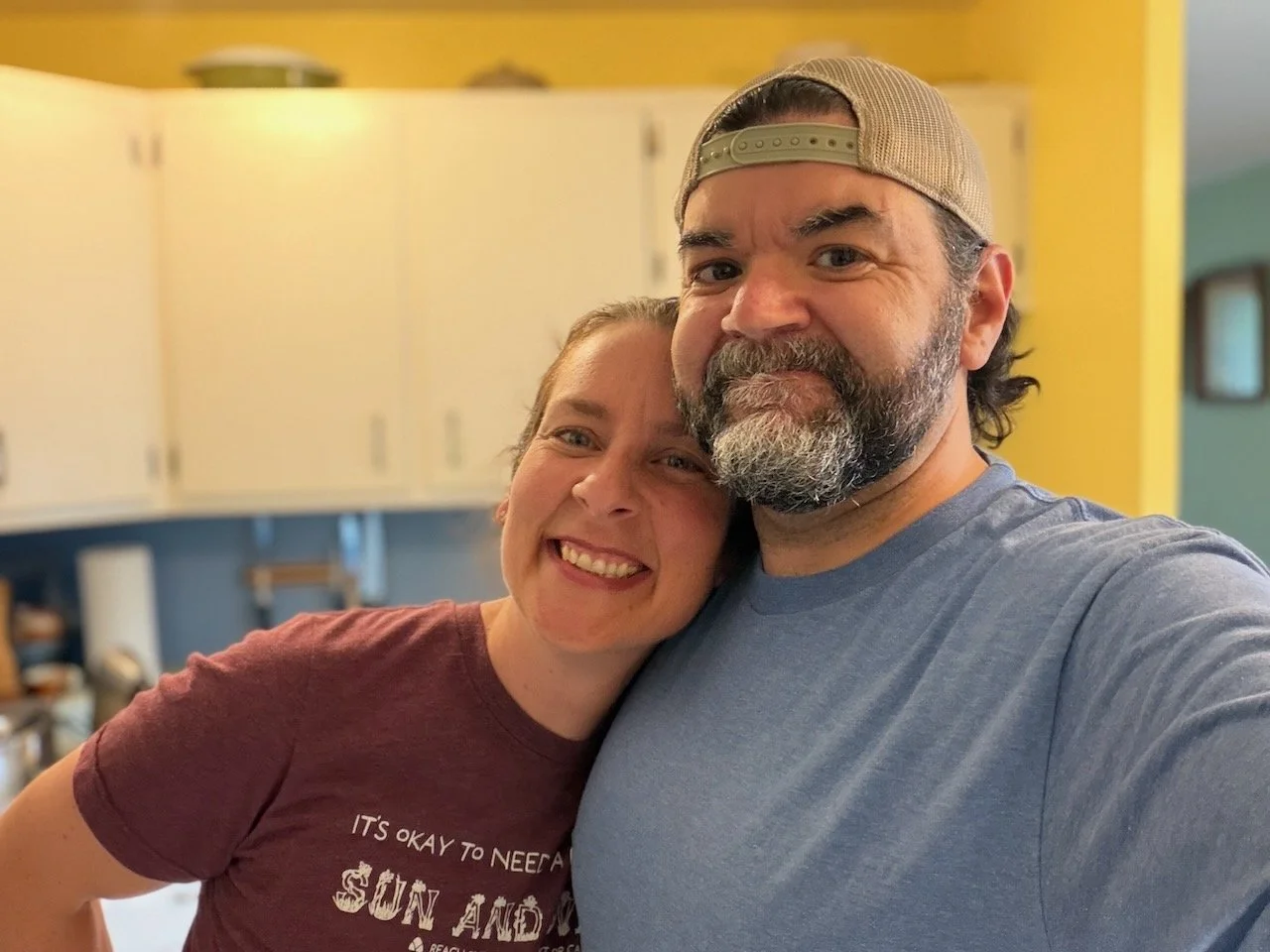 Laura Bergus and Nick Bergus pose for a selfie.