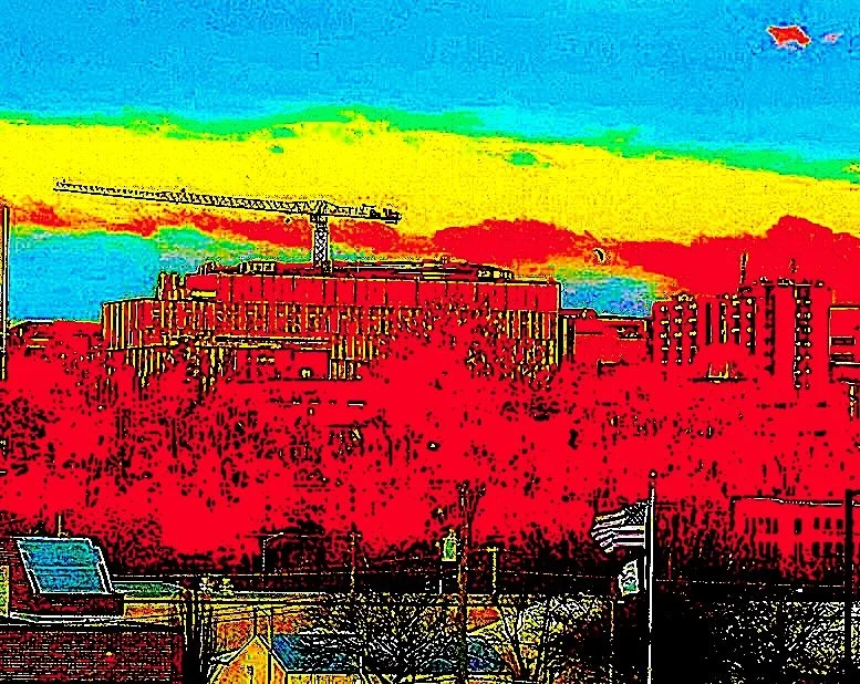 A distorted image of sunrise west campus Iowa City sunrise skyline.