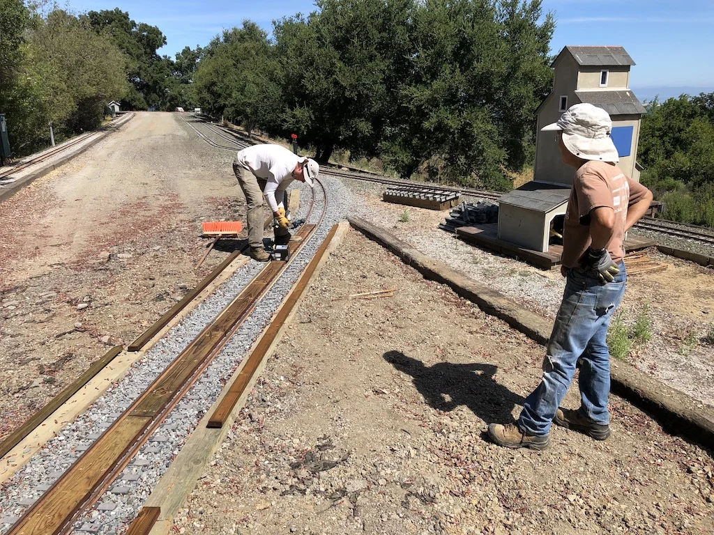 Kevin & Bruce install protection for the North Yard crossover -> Mountain Route