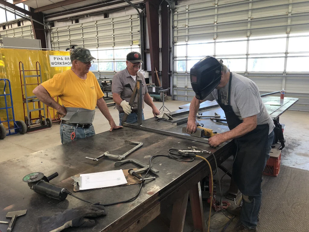 Discussing the support structure for the south overlook wall