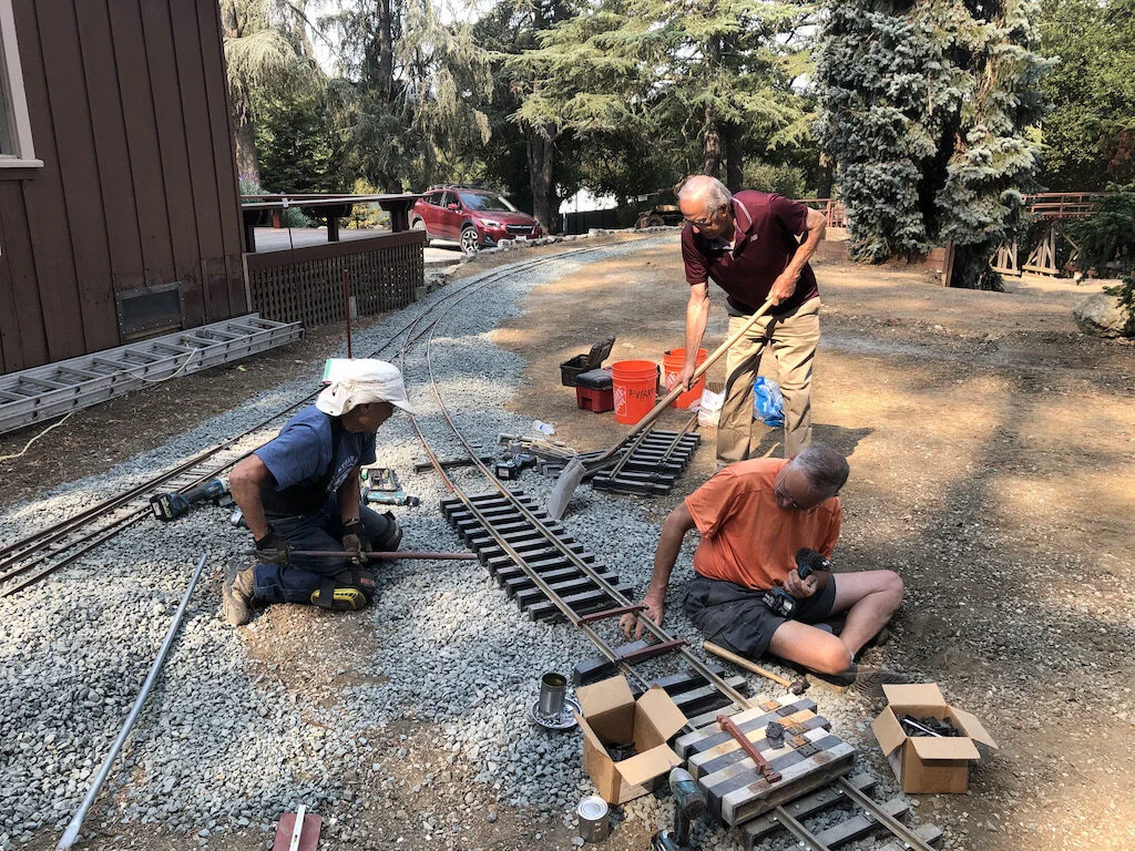 Kevin completes the caboose loop. Lance & Russ fill in ties. Bruce will then add ballast