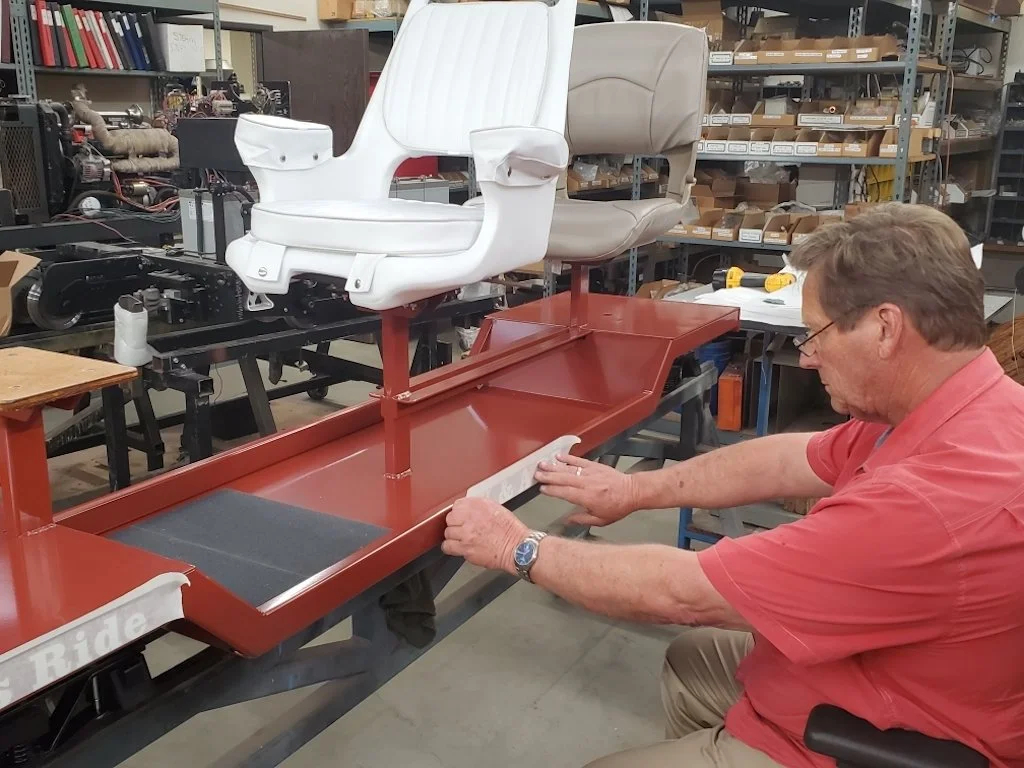 Roll Models stencils the car logo on the frame
