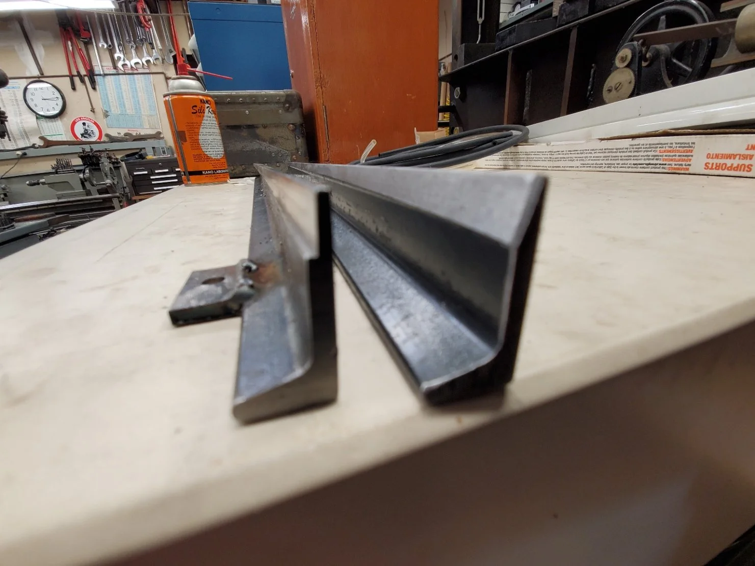 Notice the profile (on the right) which tapers into the stronger web of the base material, rather than machining a shelf which weakens the delicate end and also provides a stress riser that would more readily allow damage under repetitive