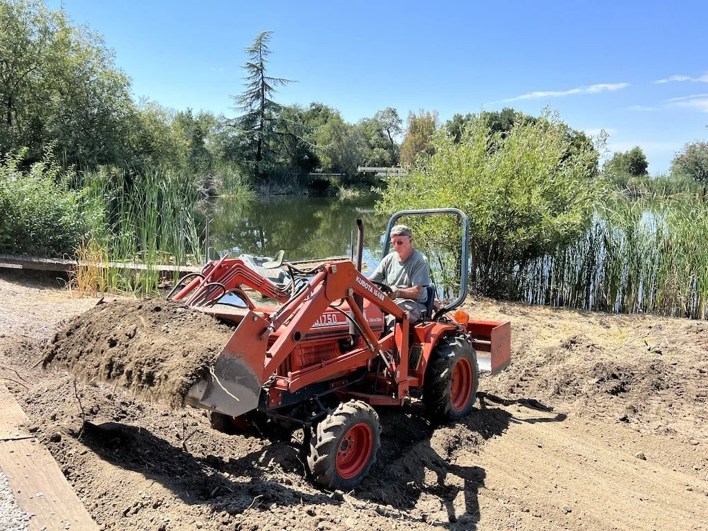 Bill was reshaping the area for the Gritty Gravel yard