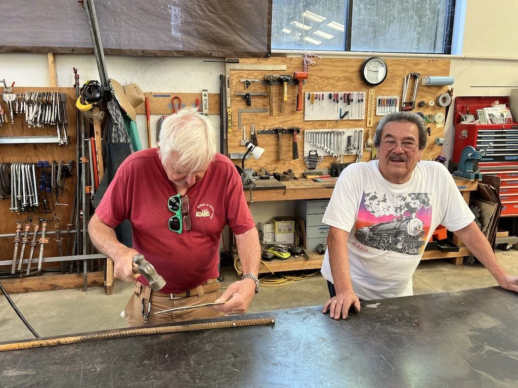 Mike & Carl repair a bent sign