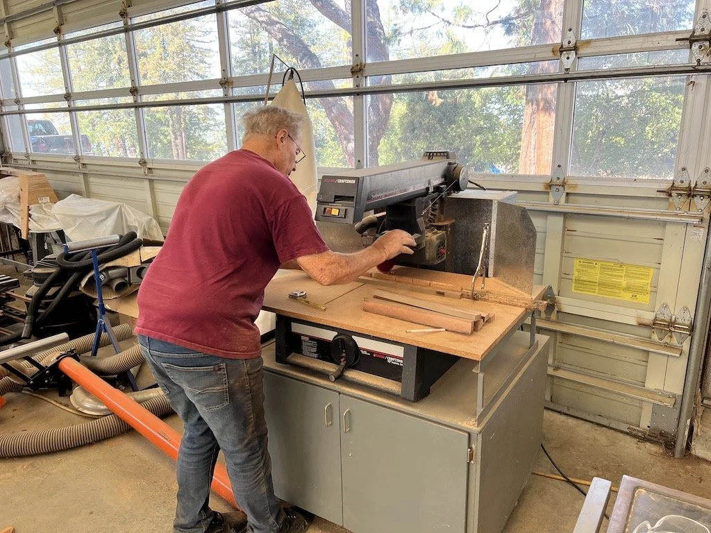 Tom cuts redwood frames for the GGB’s faux windows