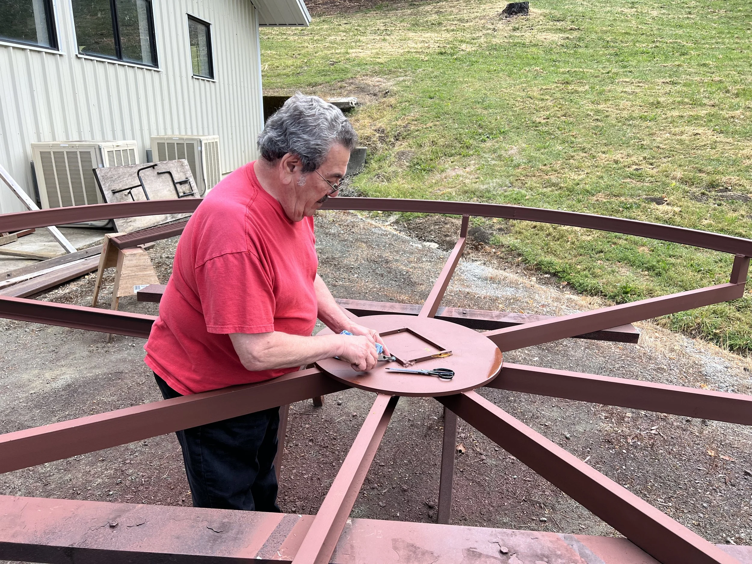 Carl was protecting the turntable's pivot point from getting painted (black)