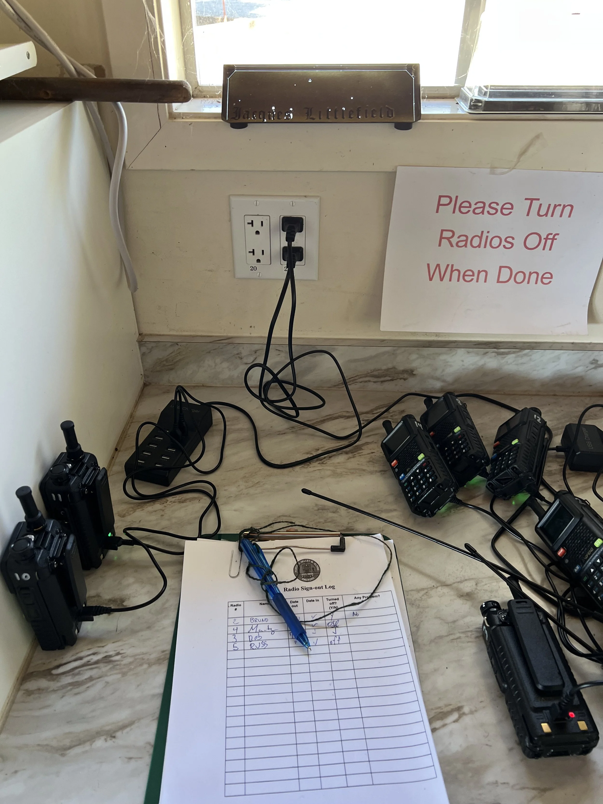 The GMRS radios wait to be borrowed