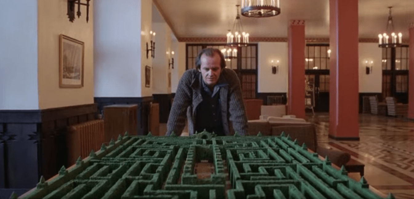 Jack looking at model of the maze - The Shining