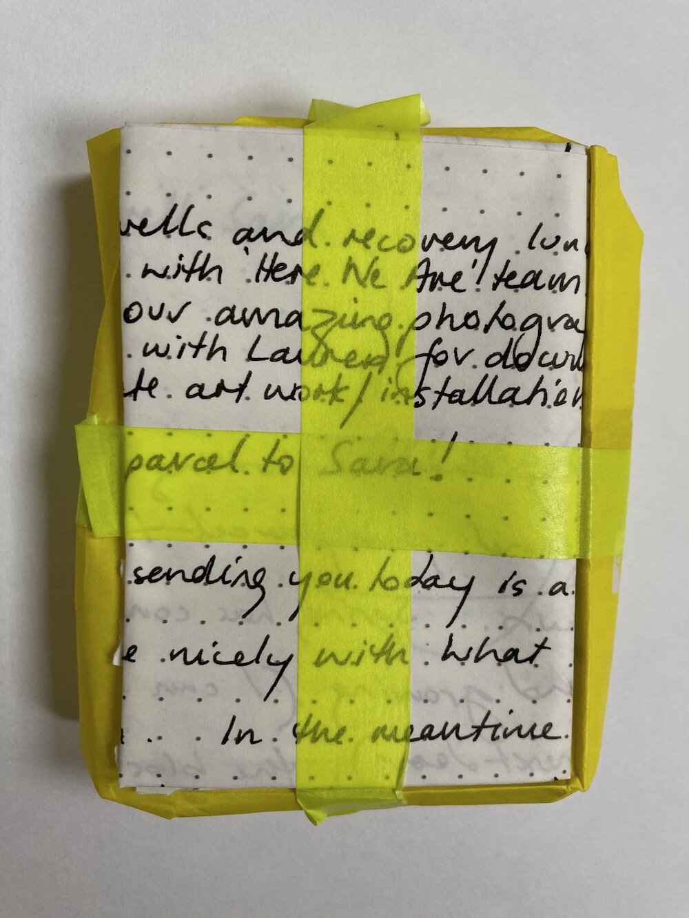 letter and yellow tape.jpg