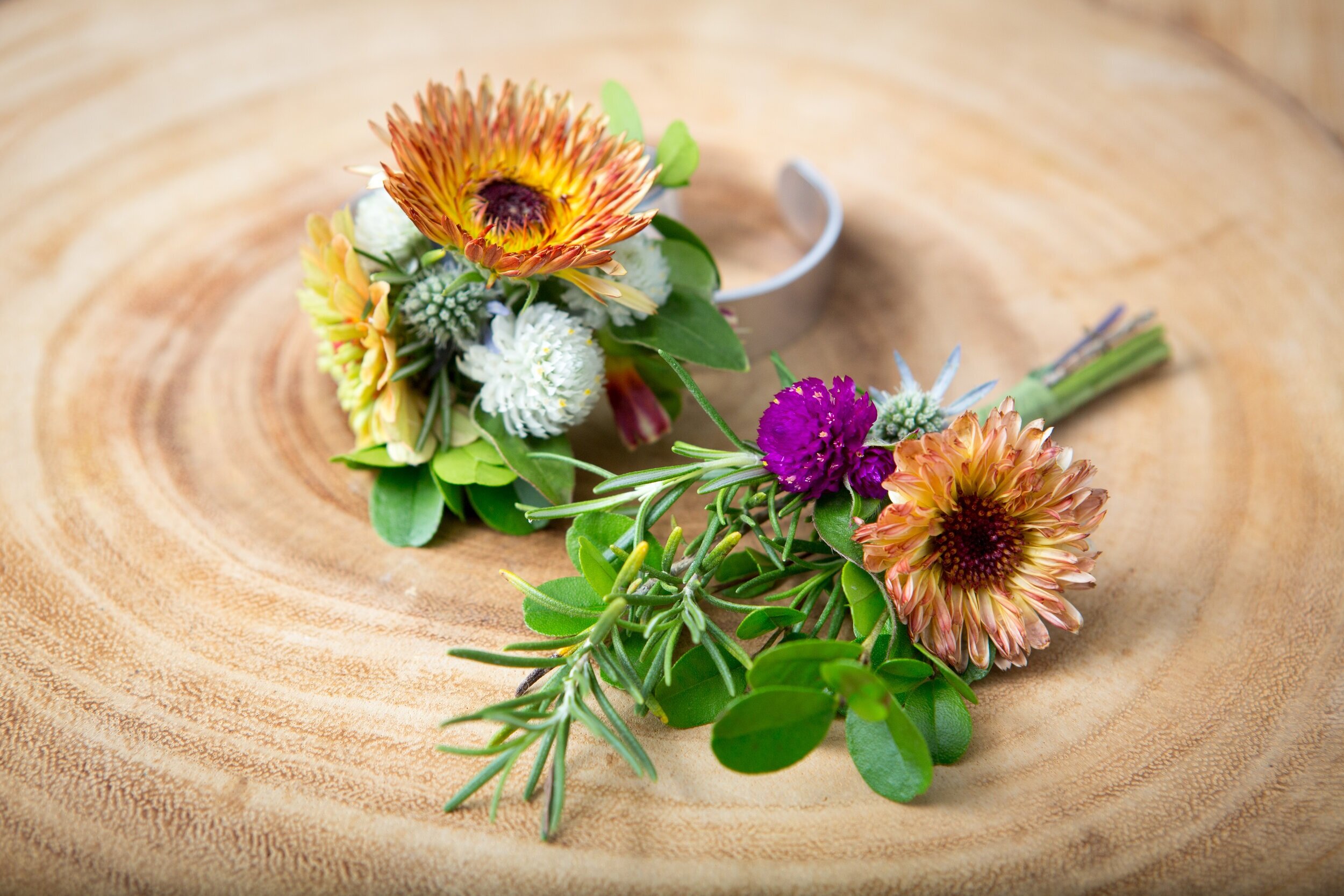 Wrist jewelry with Calendula, Gomphrena, Boxwood, Thistle, Zinnia