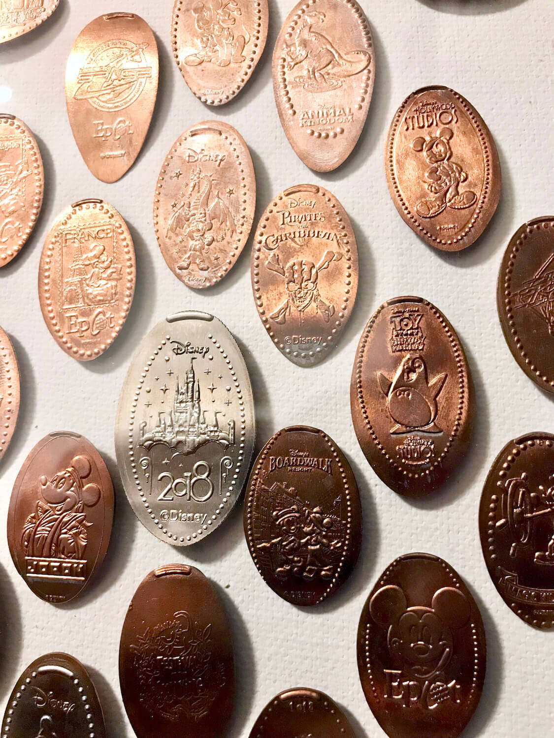 Disney Pressed Pennies Displayed In Frame In Pattern - Close Up