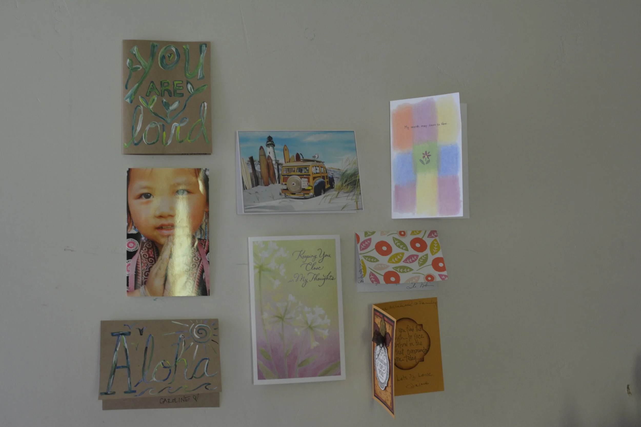 Michael Vigil cards on wall.jpg