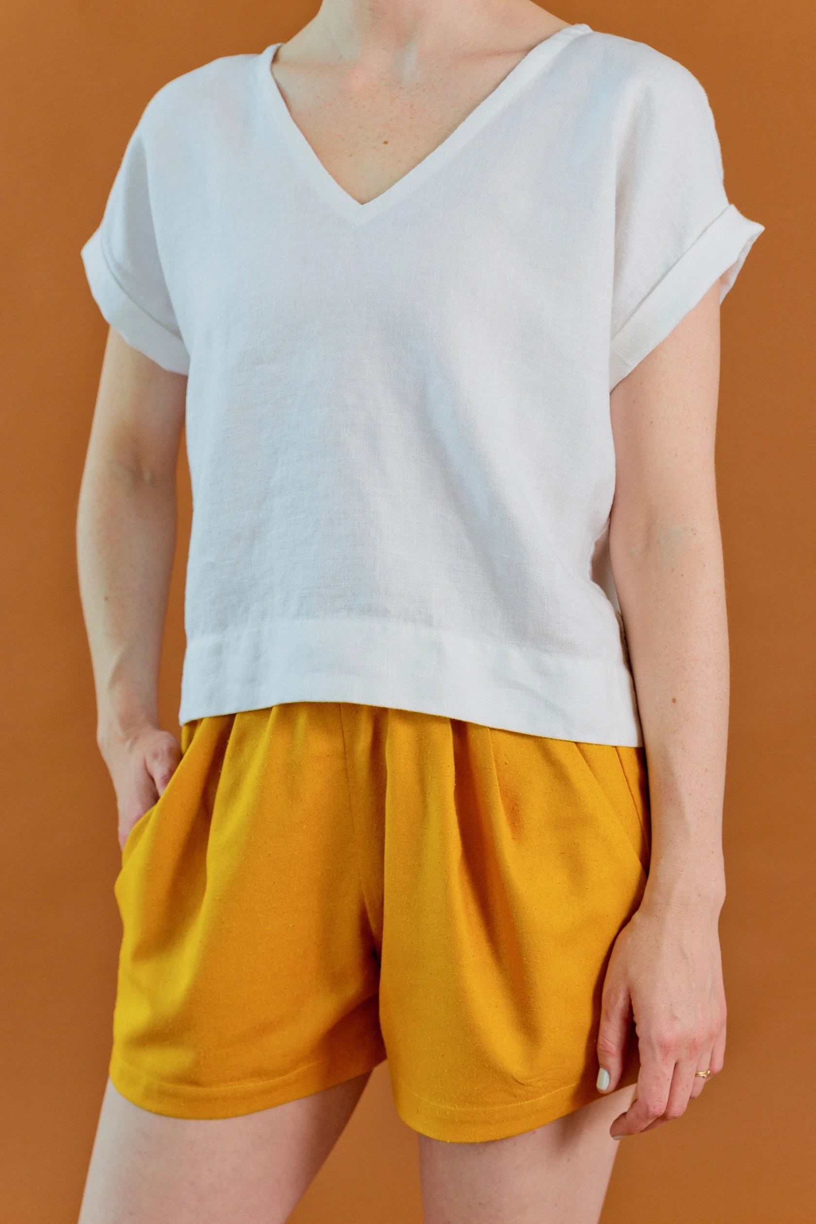 Puff Shorts in gold raw silk and Cuff Tee in white linen