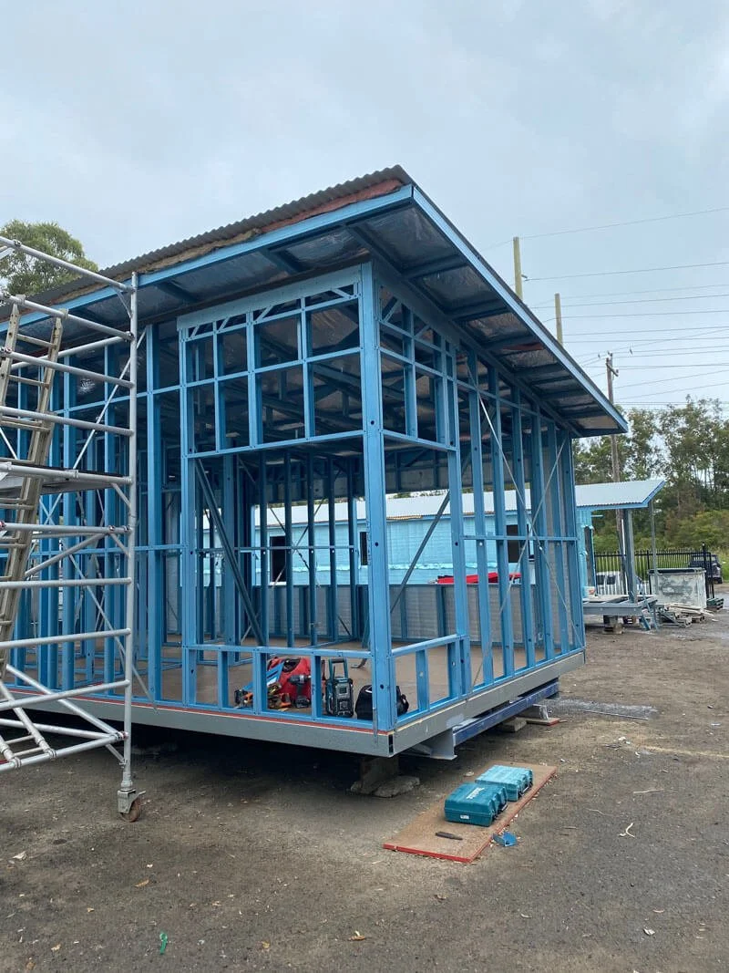 PROJECT: Six-Module Home With Garage On A Sloping Site